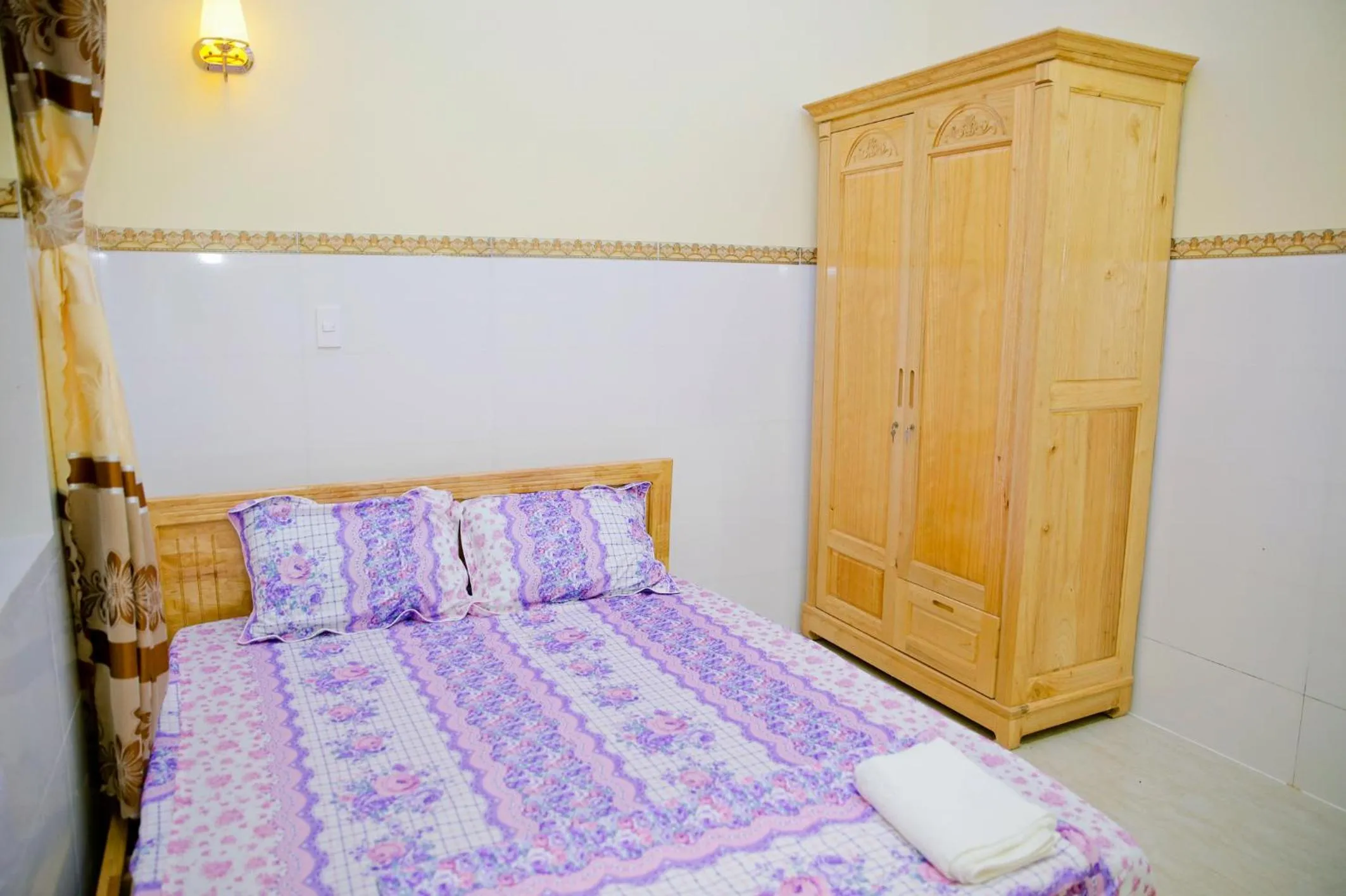 Bed in Nhà Nghỉ Quê Ló