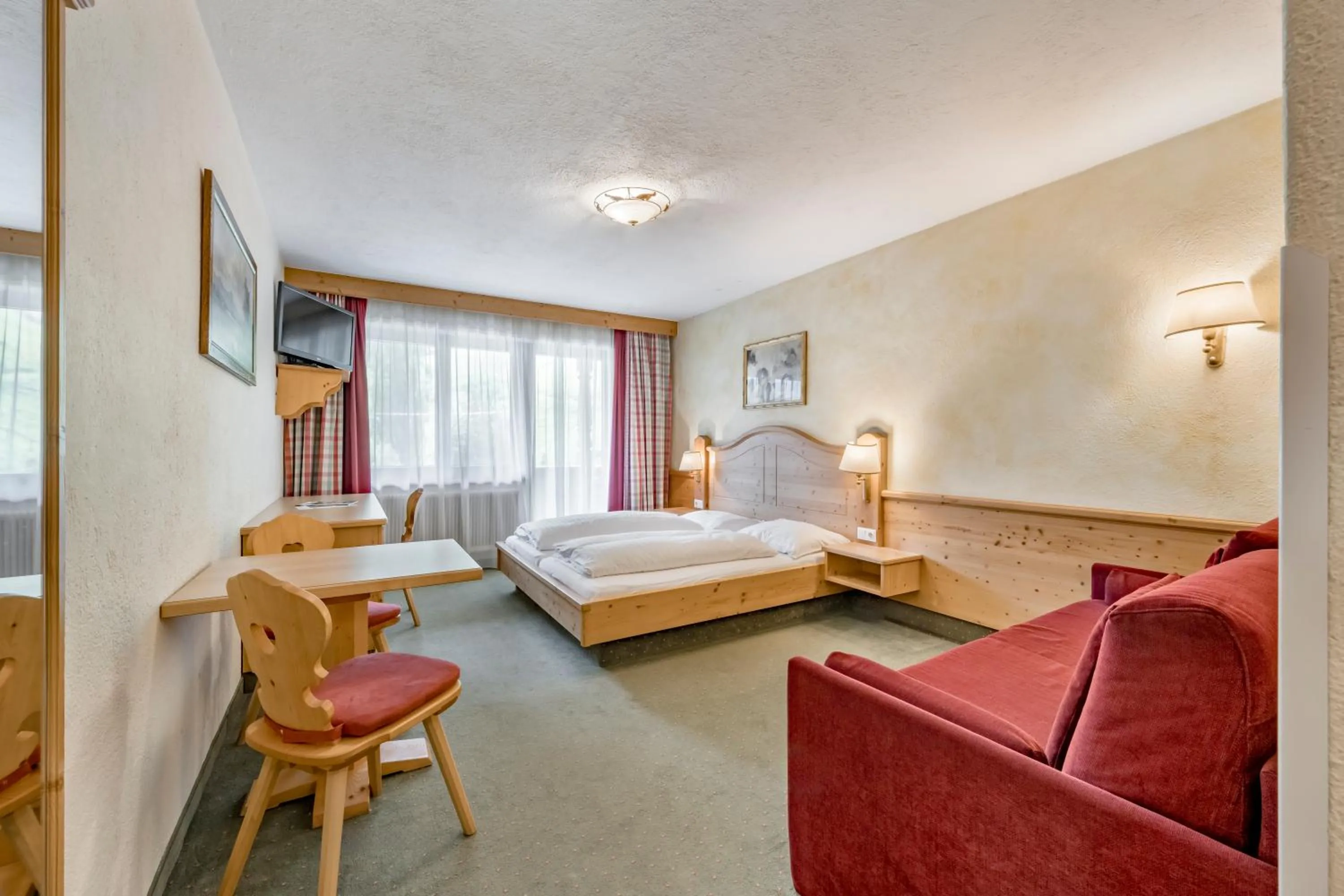 Photo of the whole room, Bed in Pension Almrausch
