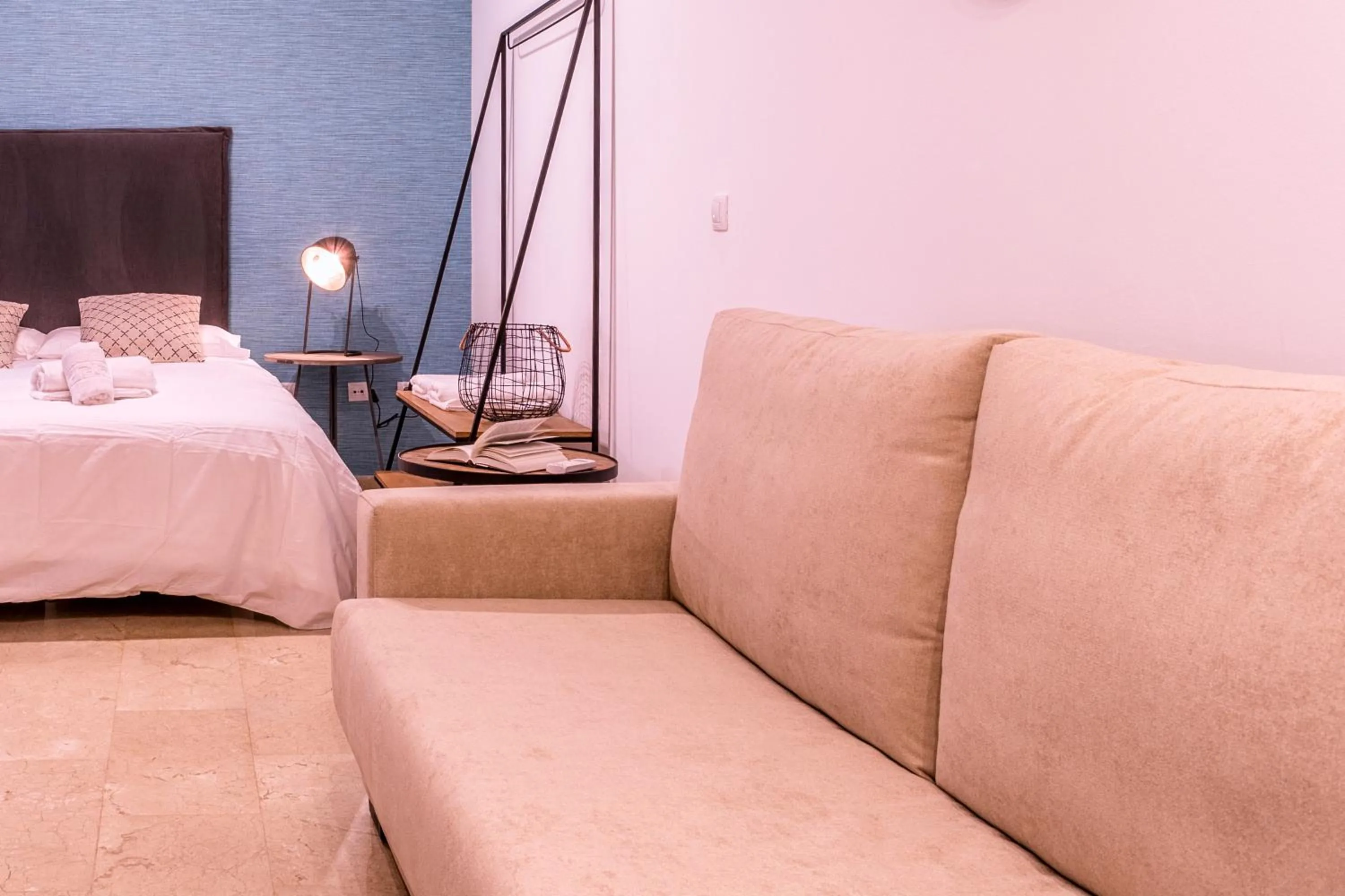 Living room, Bed in Málaga Central Suites