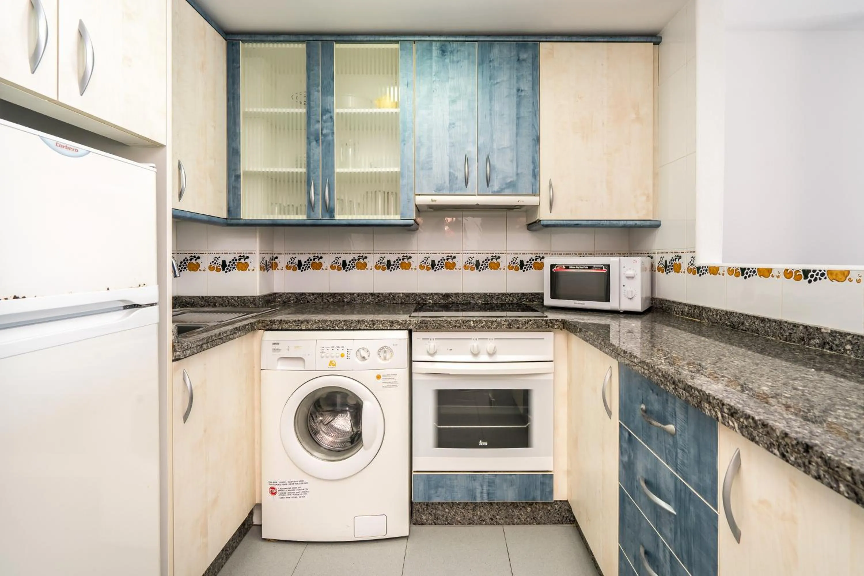 Kitchen or kitchenette in Apartamentos Hipocampos Unitursa