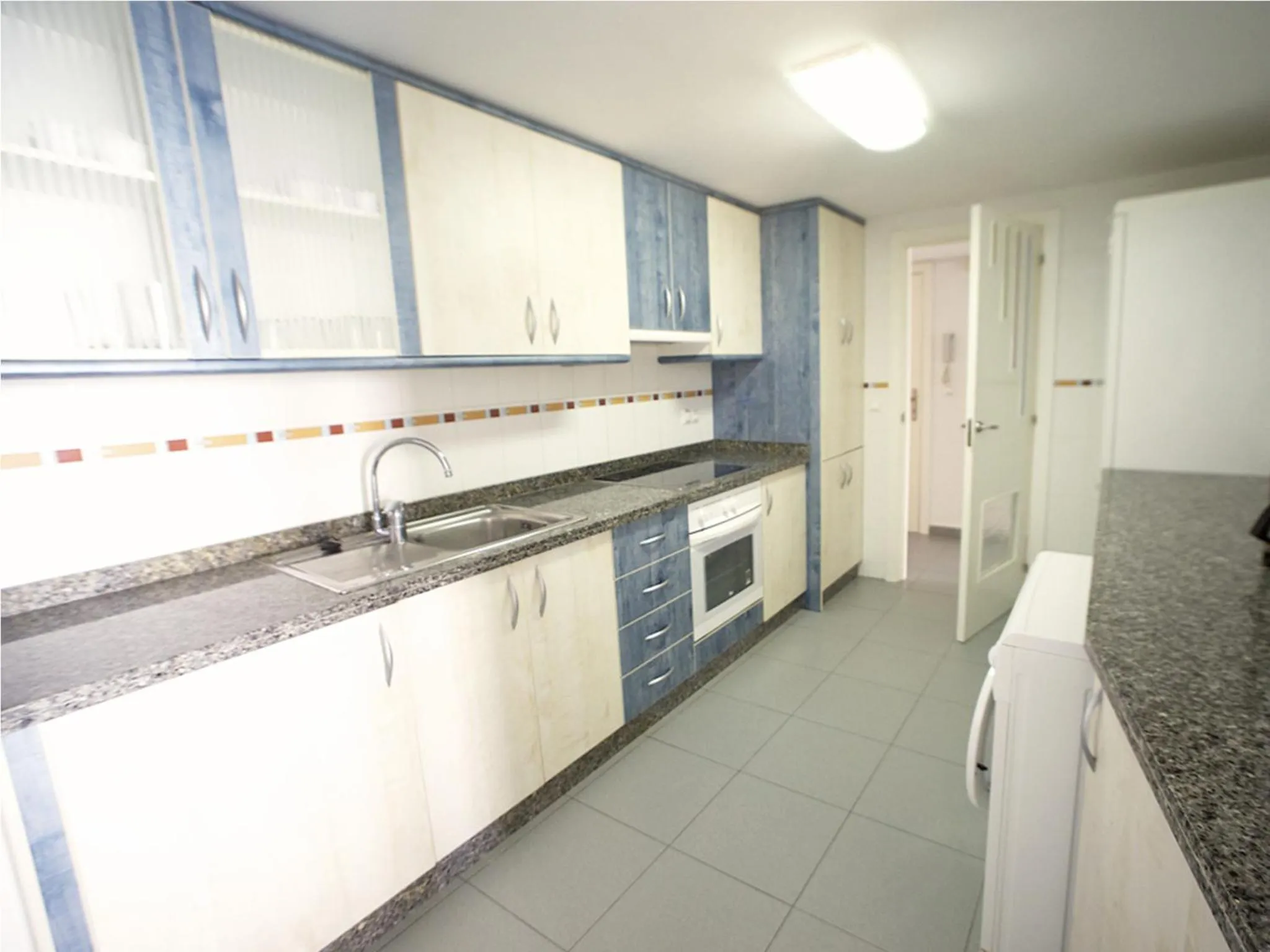 Kitchen or kitchenette in Apartamentos Hipocampos Unitursa