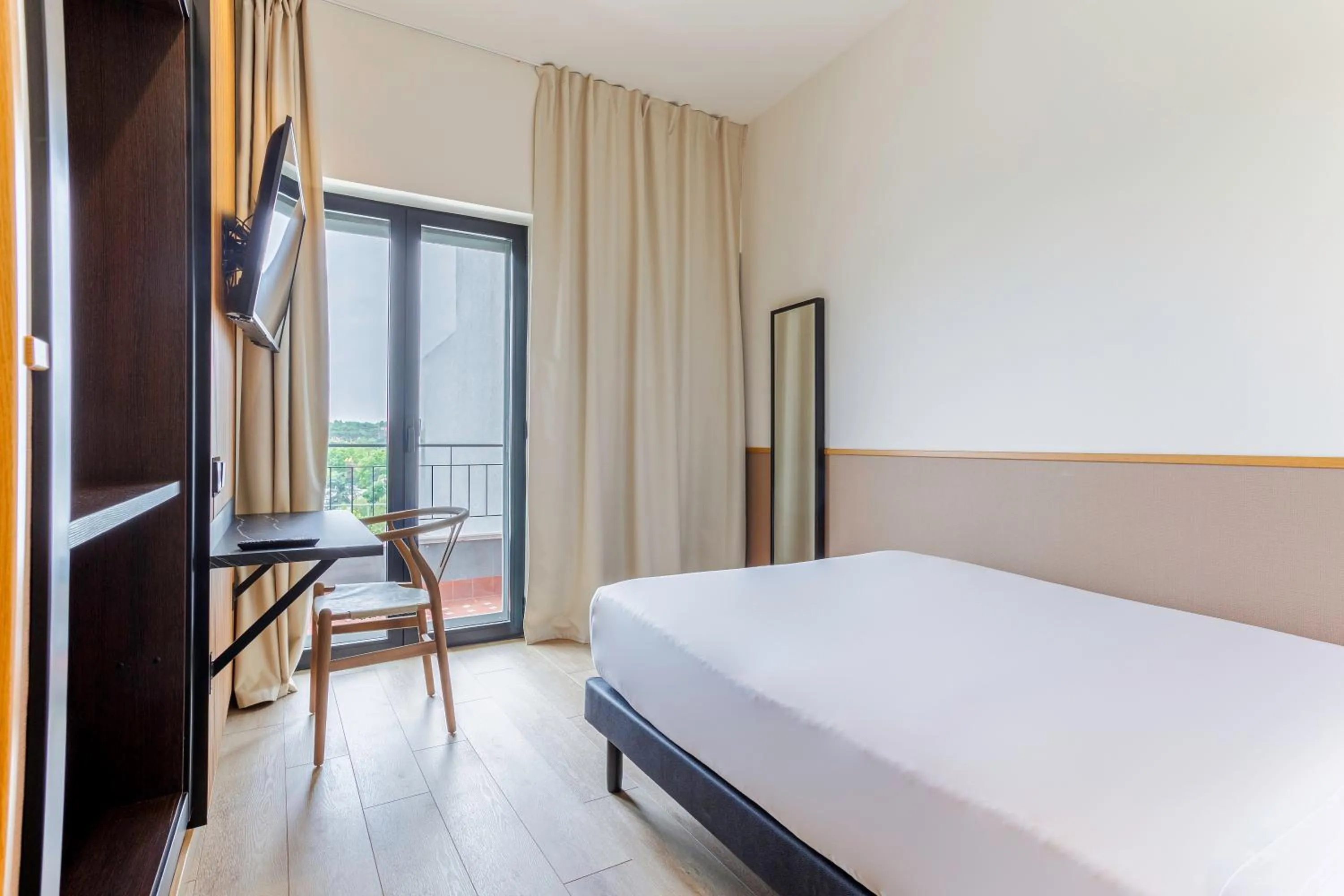 Bed in Hotel Acta Madfor