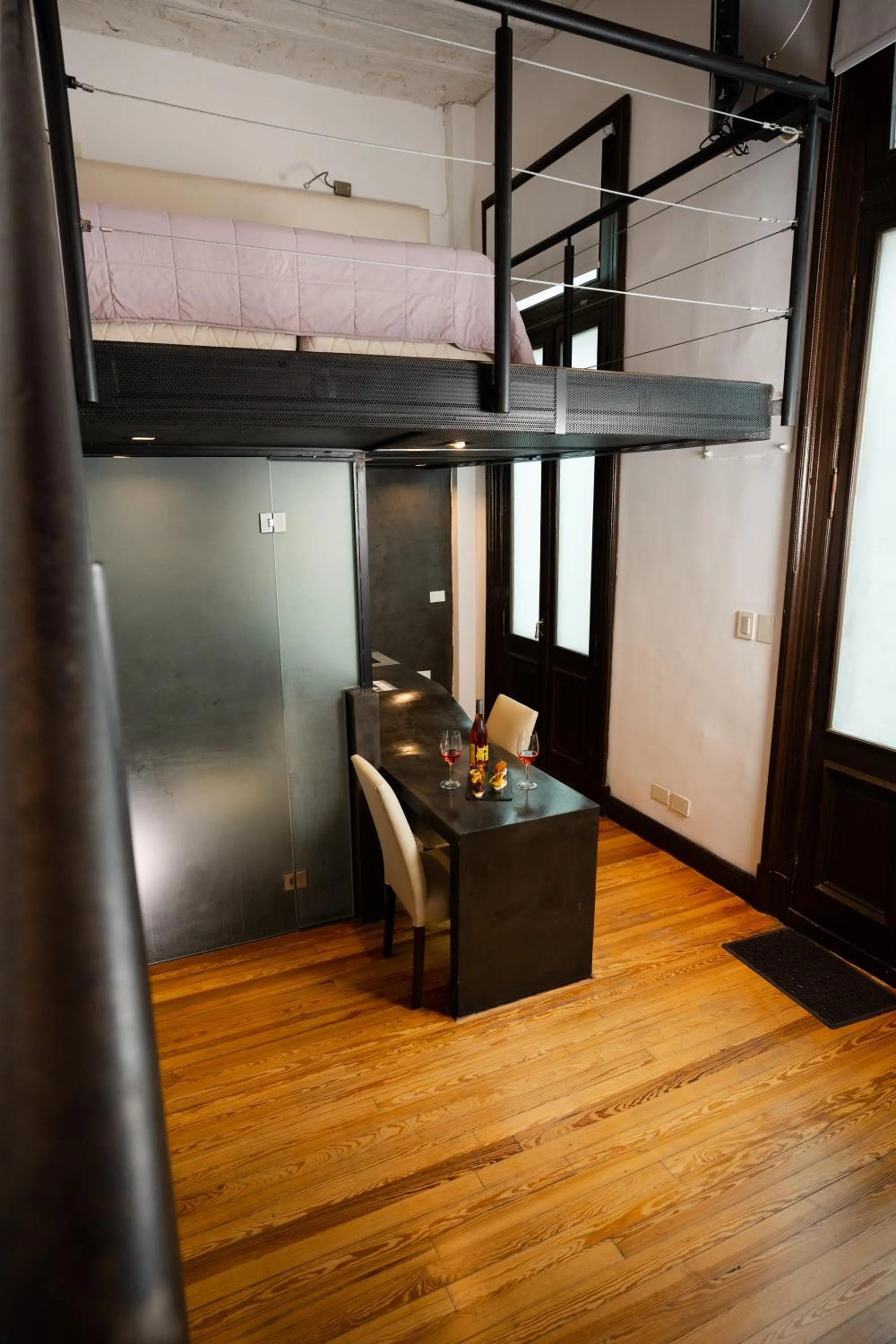 Bed in Loft Osteria by Sagardi