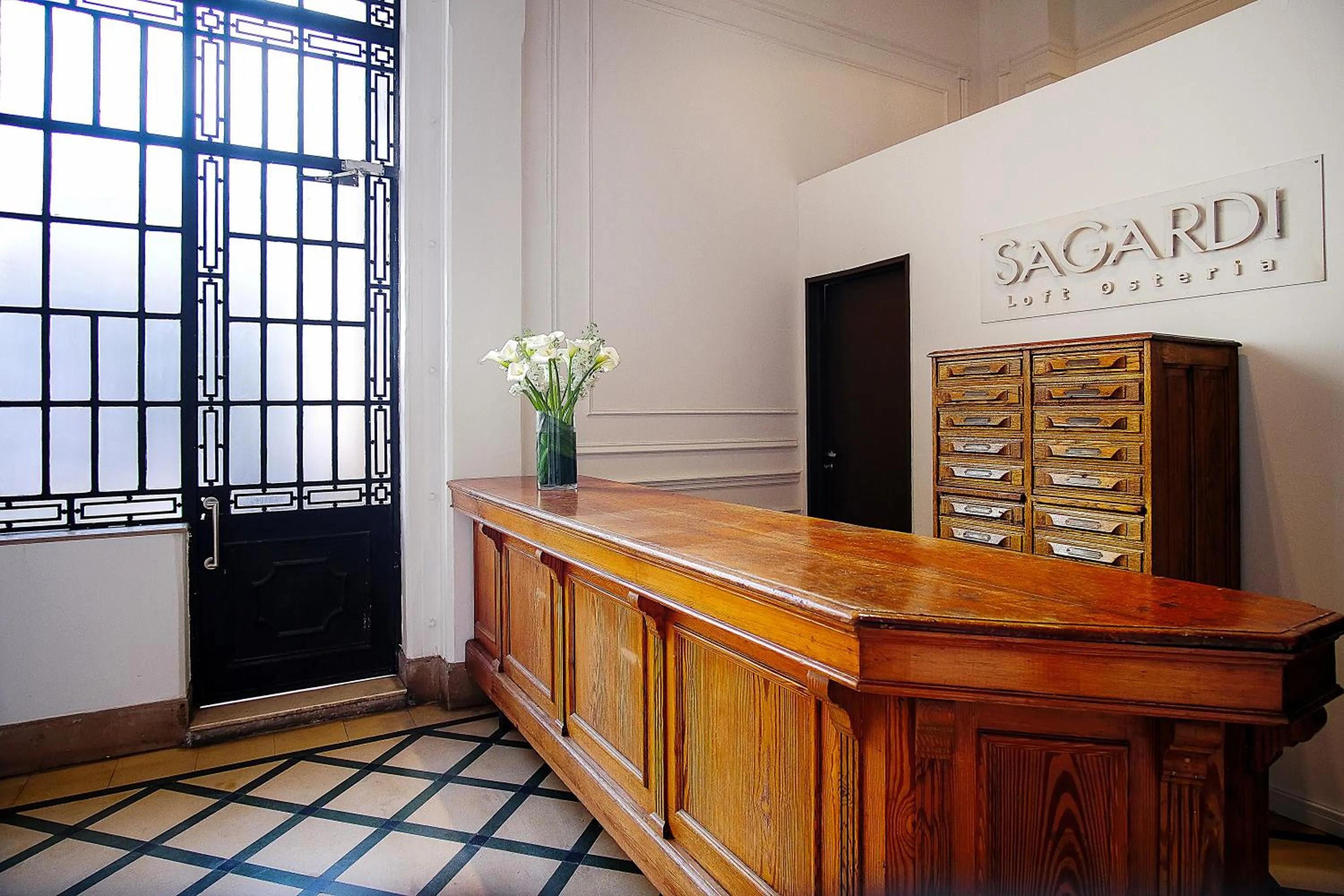 Property logo or sign in Loft Osteria by Sagardi