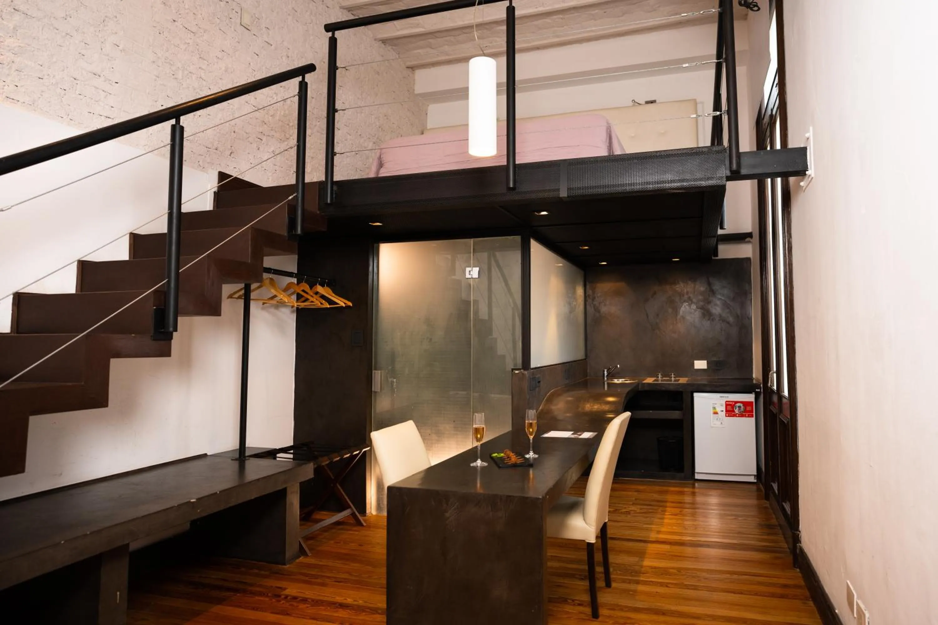 Kitchen or kitchenette in Loft Osteria by Sagardi