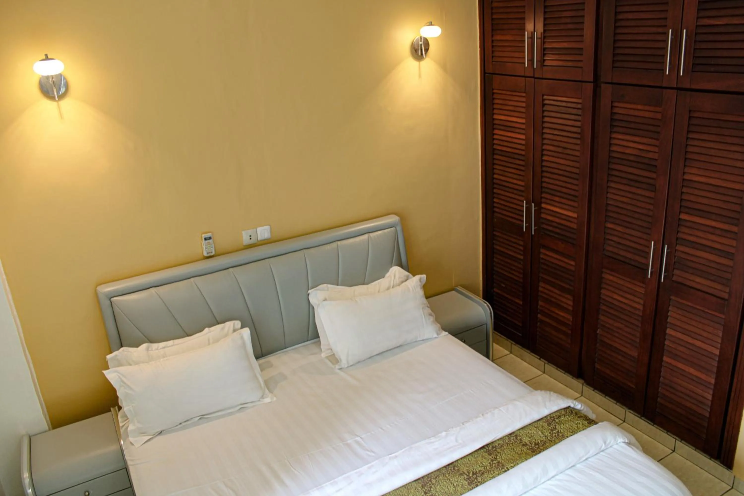 Bed in Residence Le Carat Bonapriso