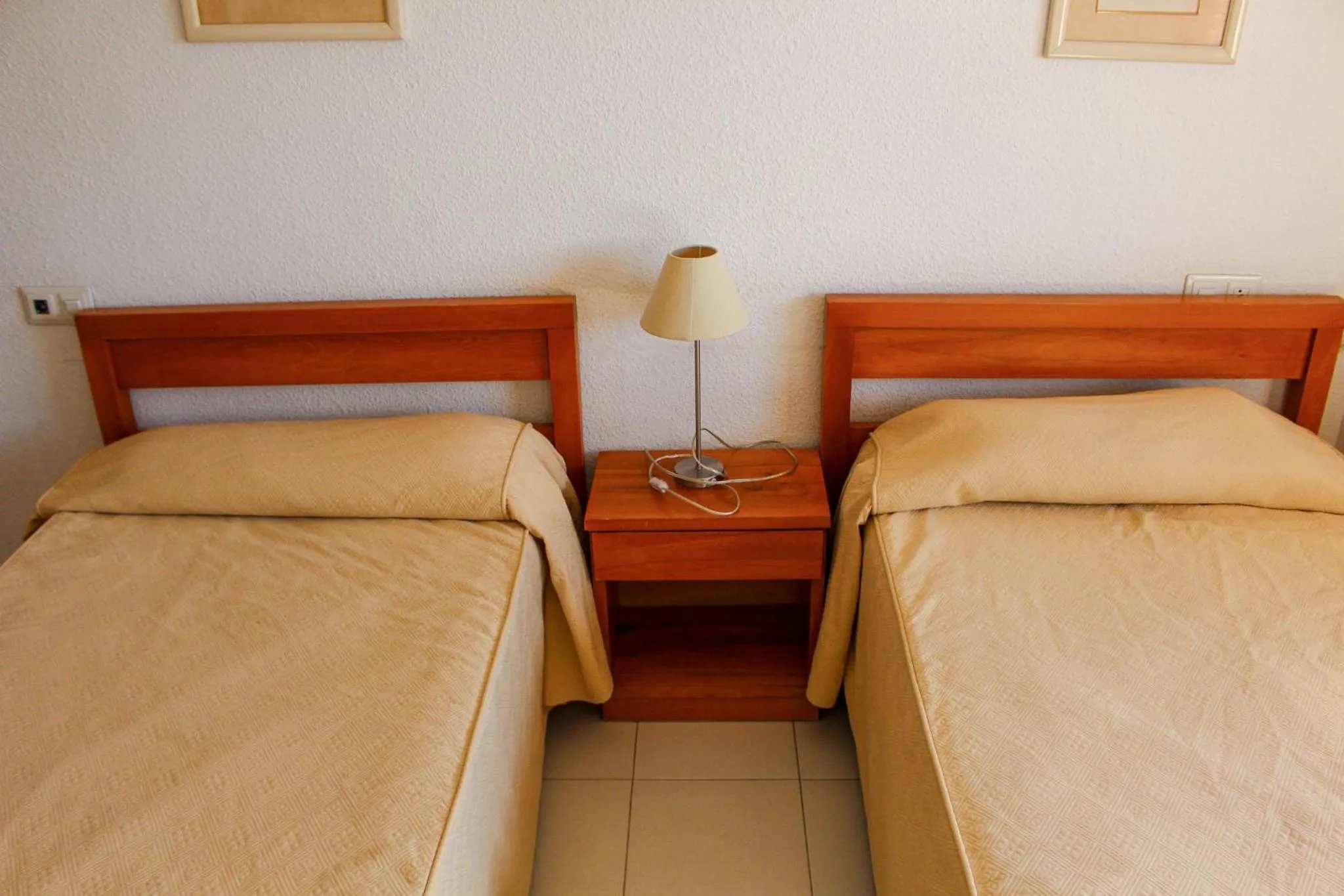 Bed in Apartamentos Turmalina Unitursa