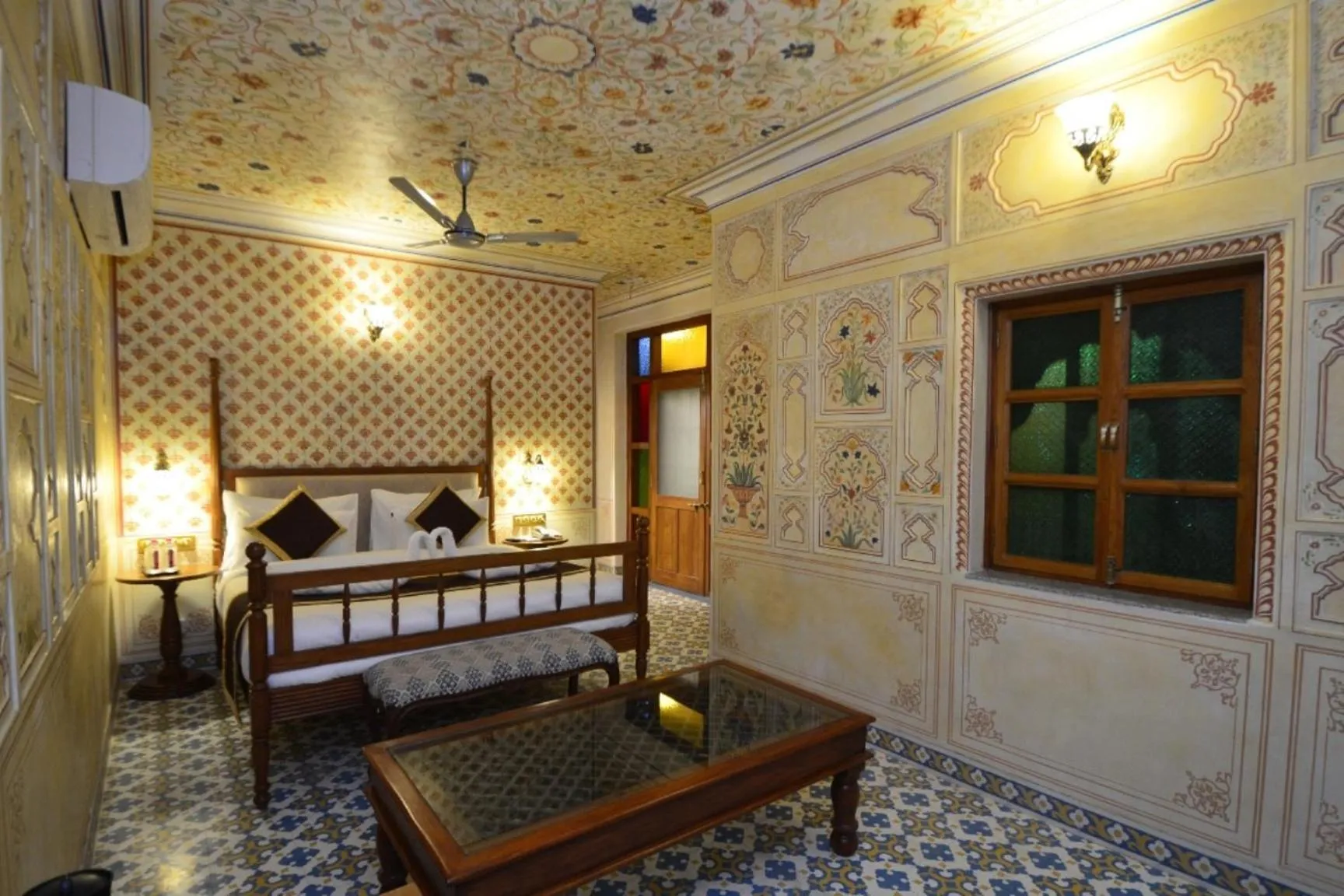 Bed in Nirbana Palace - A Heritage Hotel and Spa