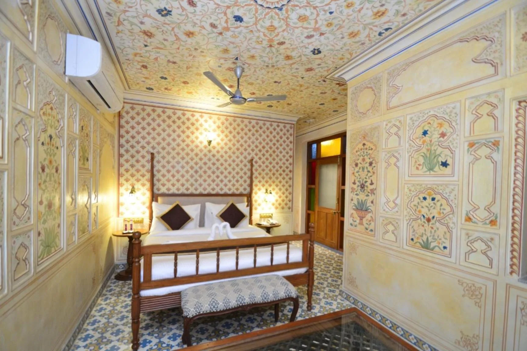 Bed in Nirbana Palace - A Heritage Hotel and Spa