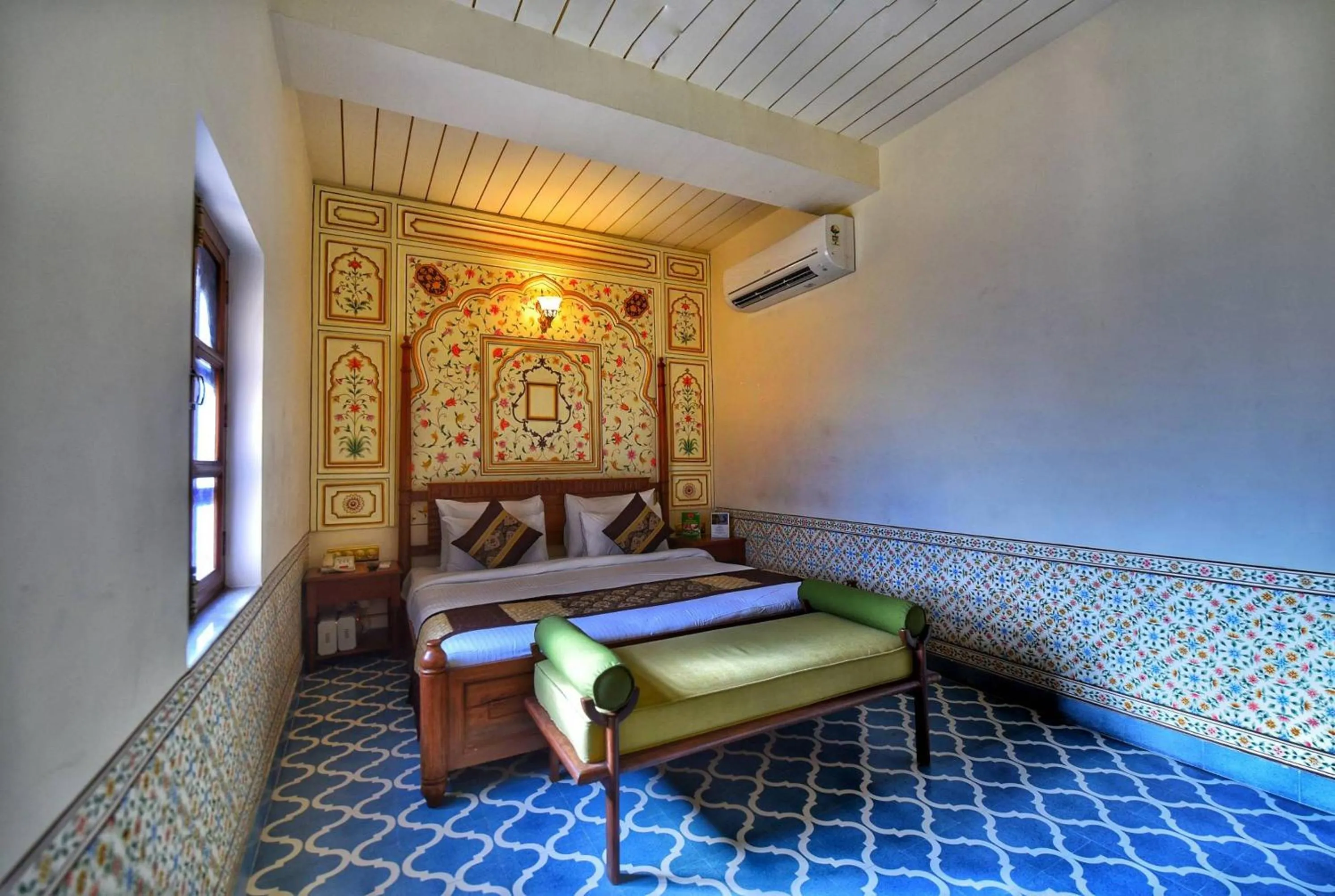 Bed in Nirbana Palace - A Heritage Hotel and Spa