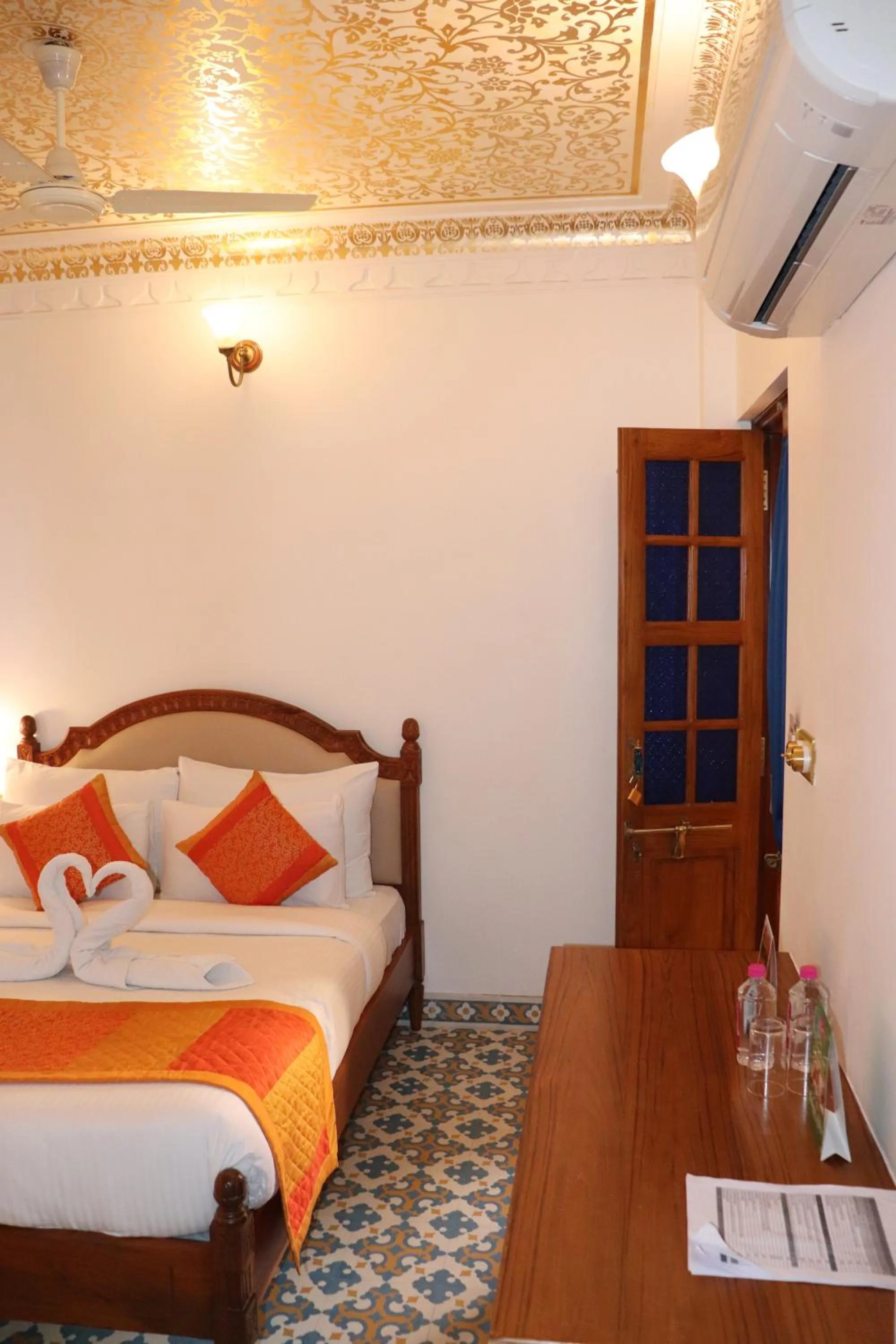 Bed in Nirbana Palace - A Heritage Hotel and Spa