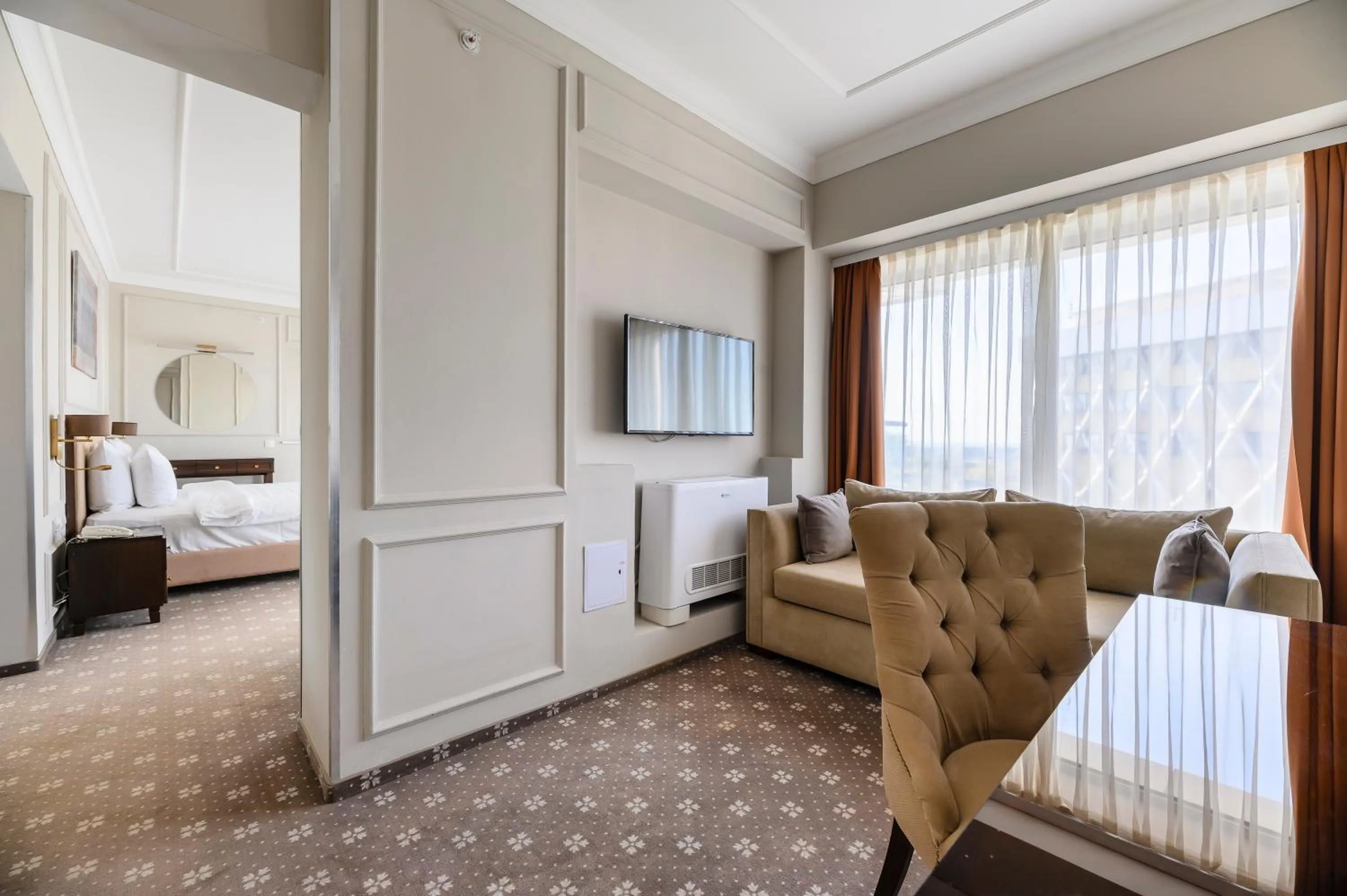 Seating area, Bed in Almaty Hotel