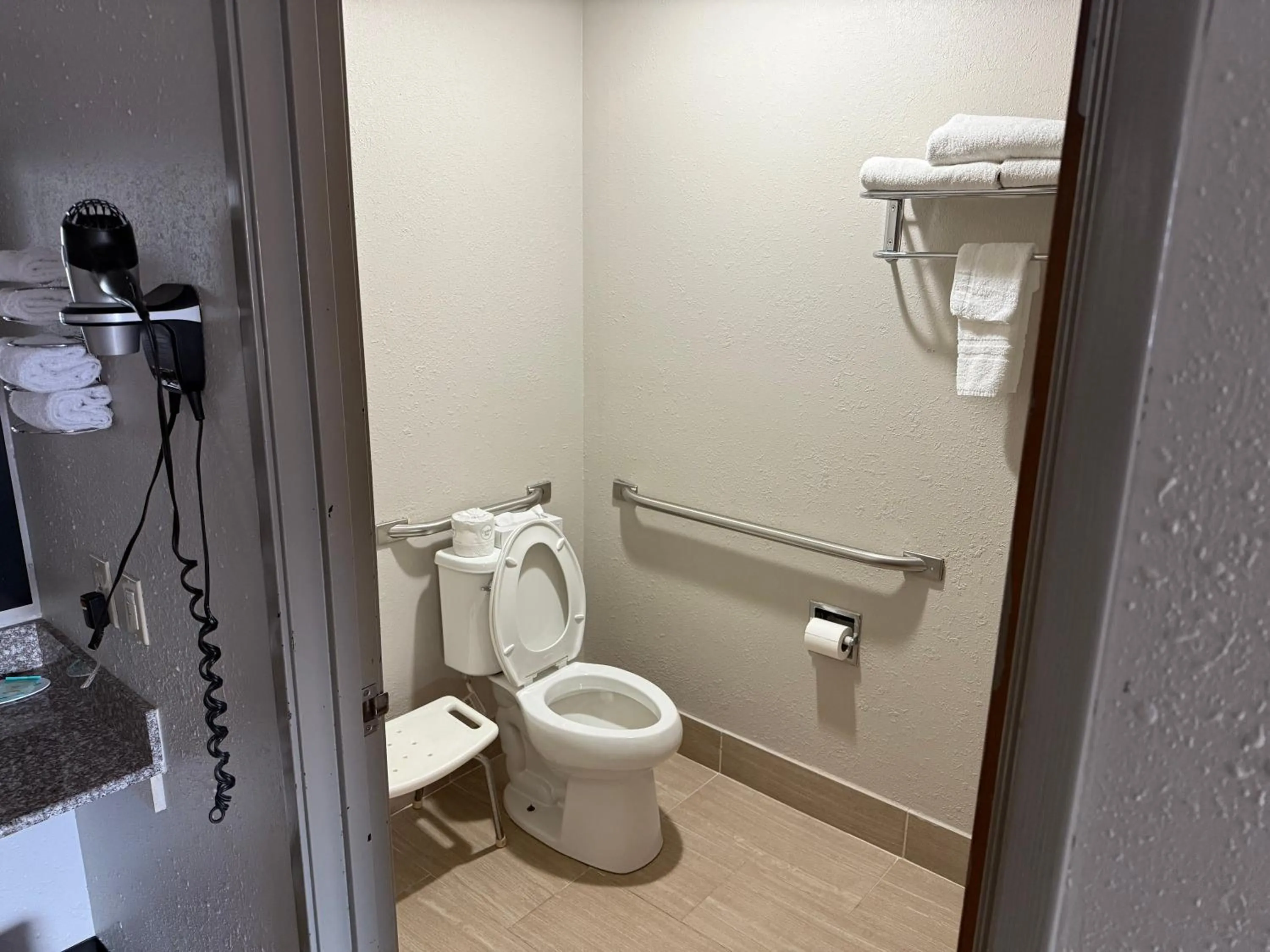 Toilet in Days Inn by Wyndham Muncie -Ball State University