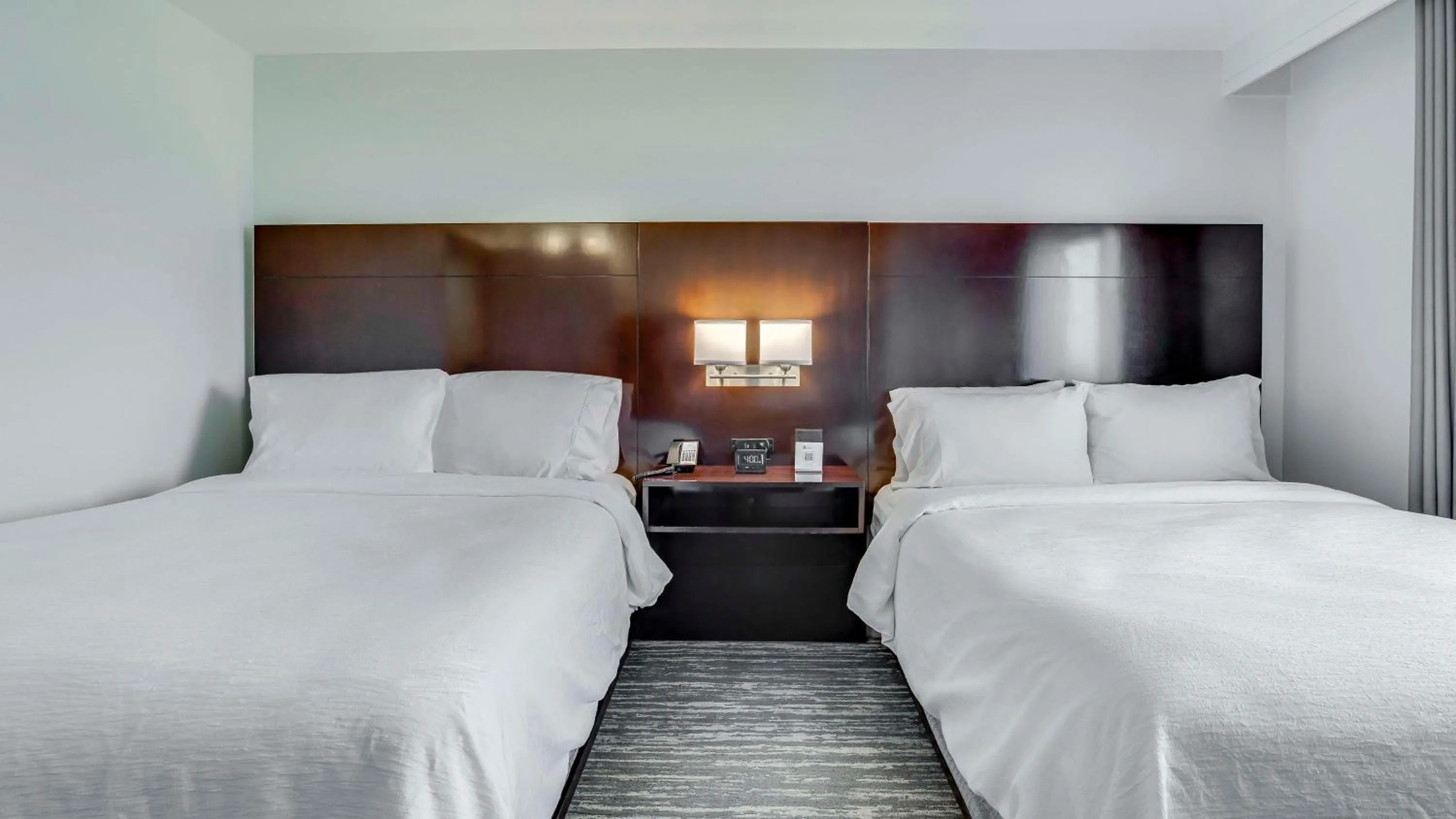 Bed in Embassy Suites by Hilton Louisville East