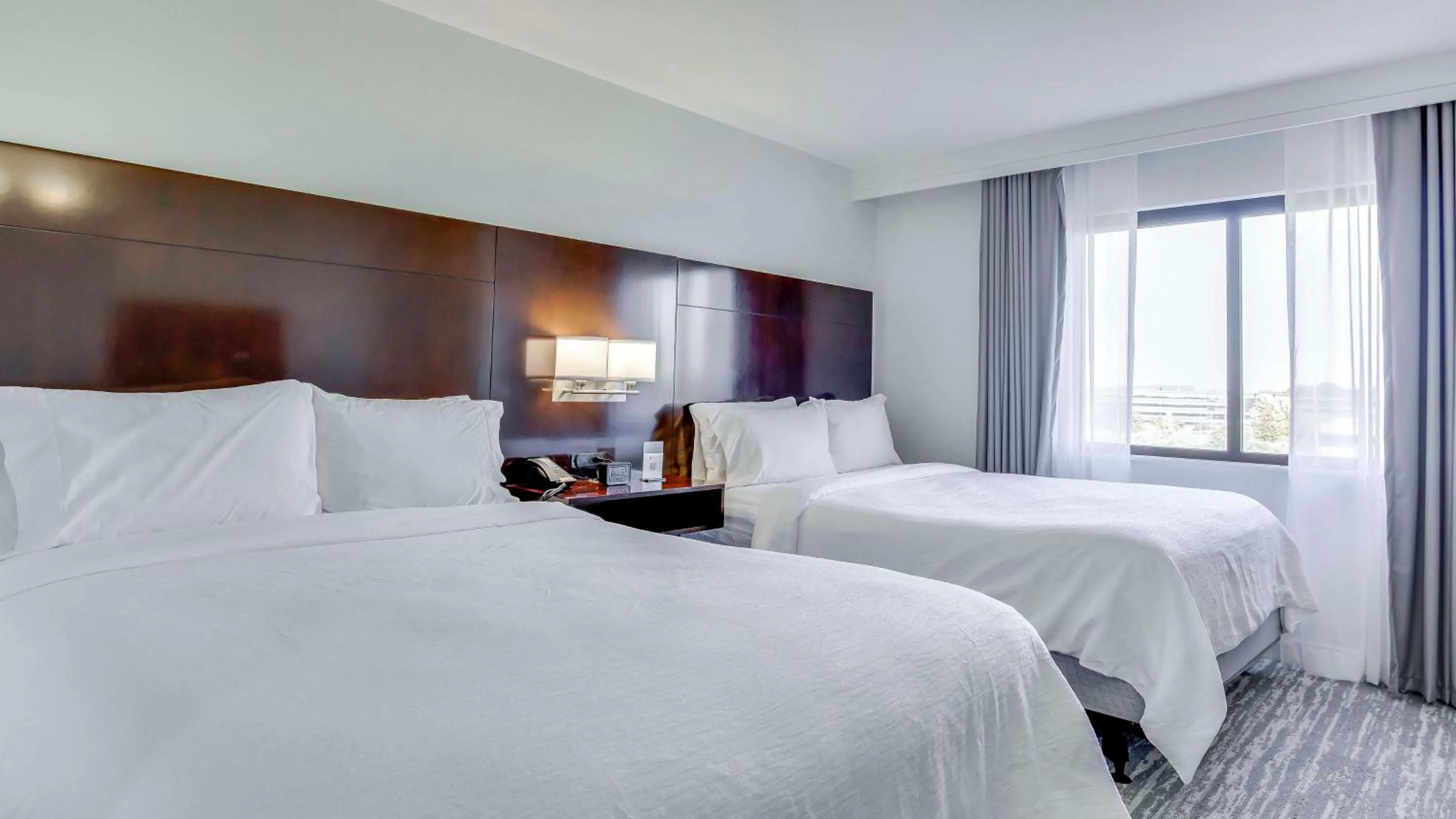 Bed in Embassy Suites by Hilton Louisville East