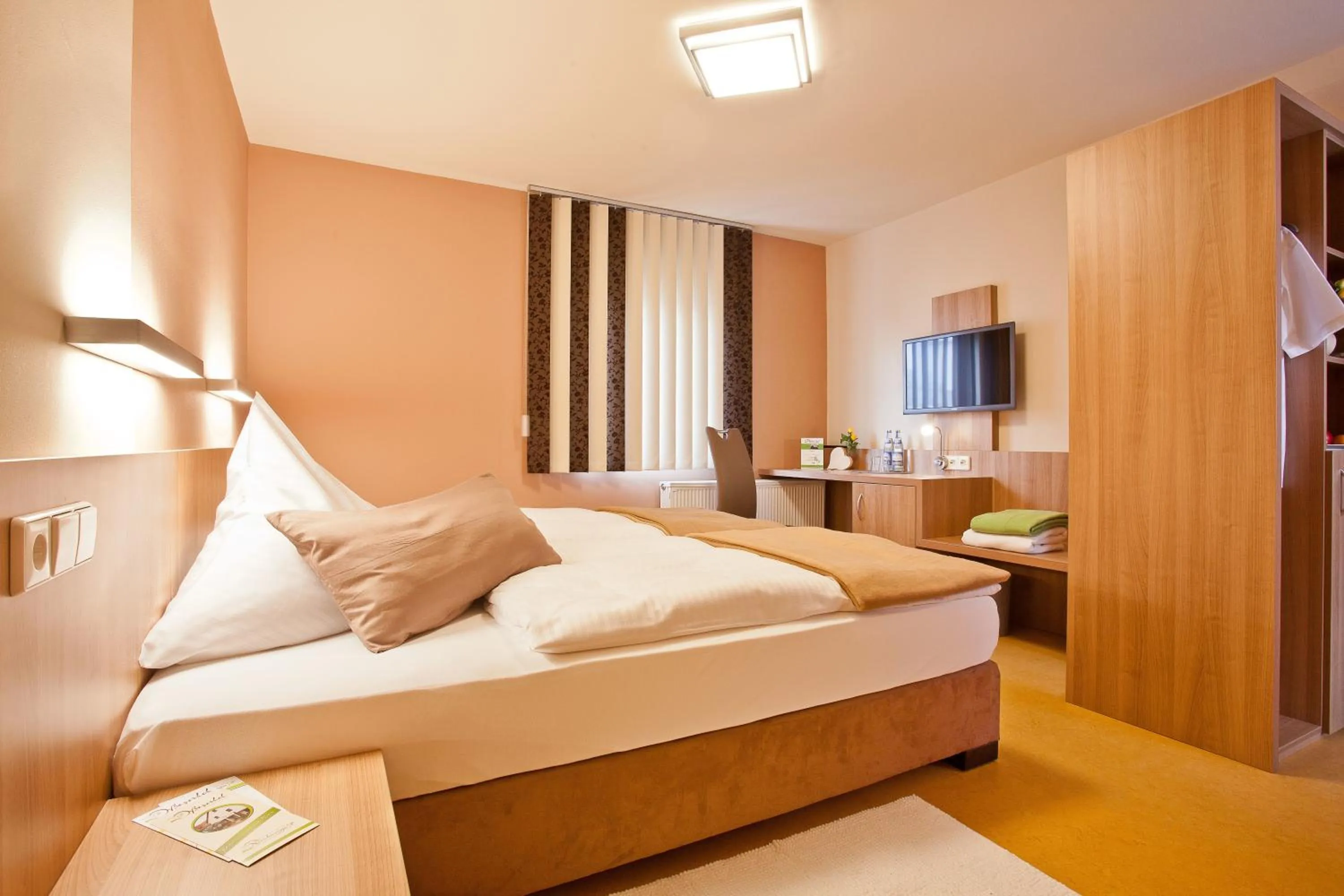 Photo of the whole room, Bed in Landhotel Oßwald