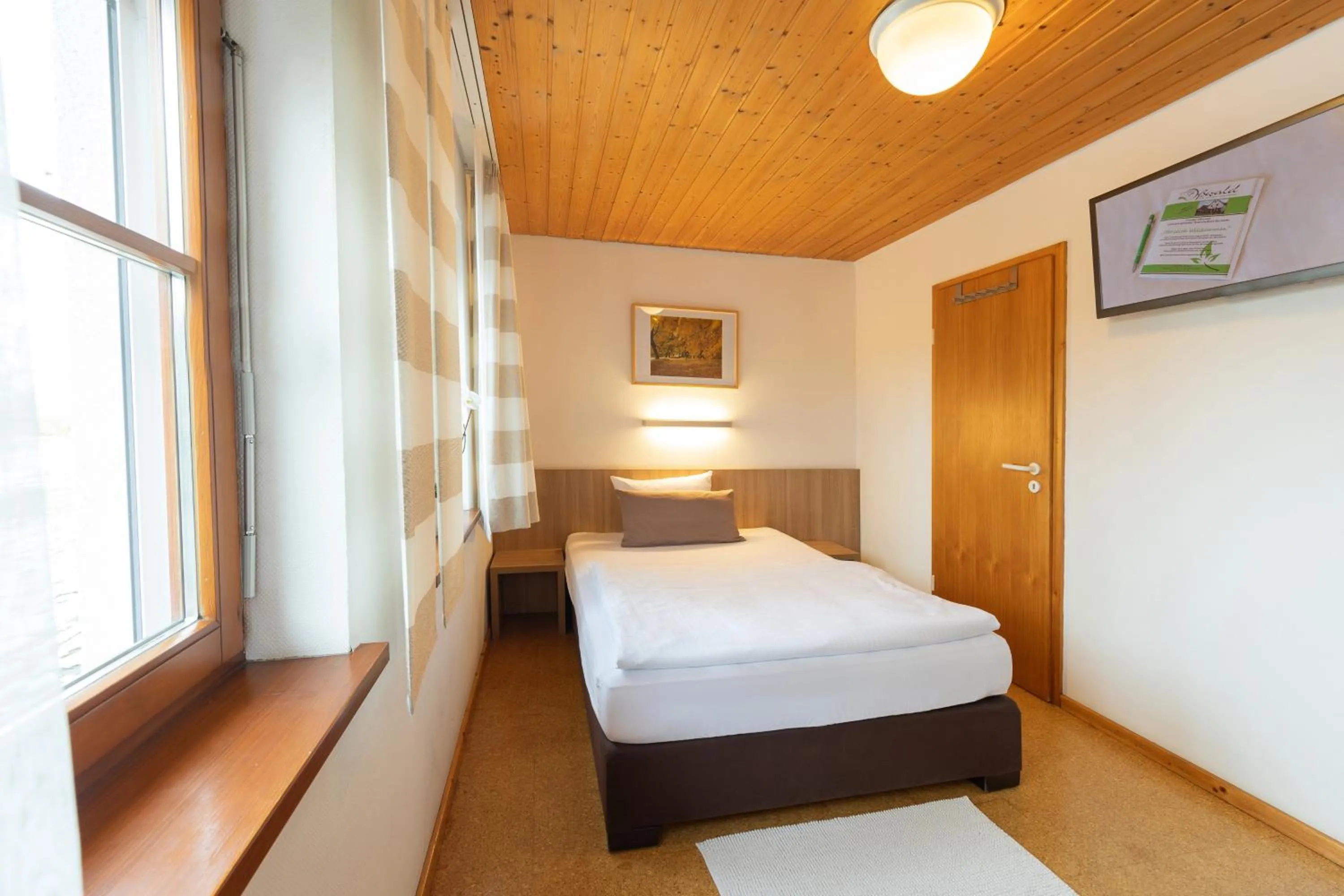 Photo of the whole room, Bed in Landhotel Oßwald