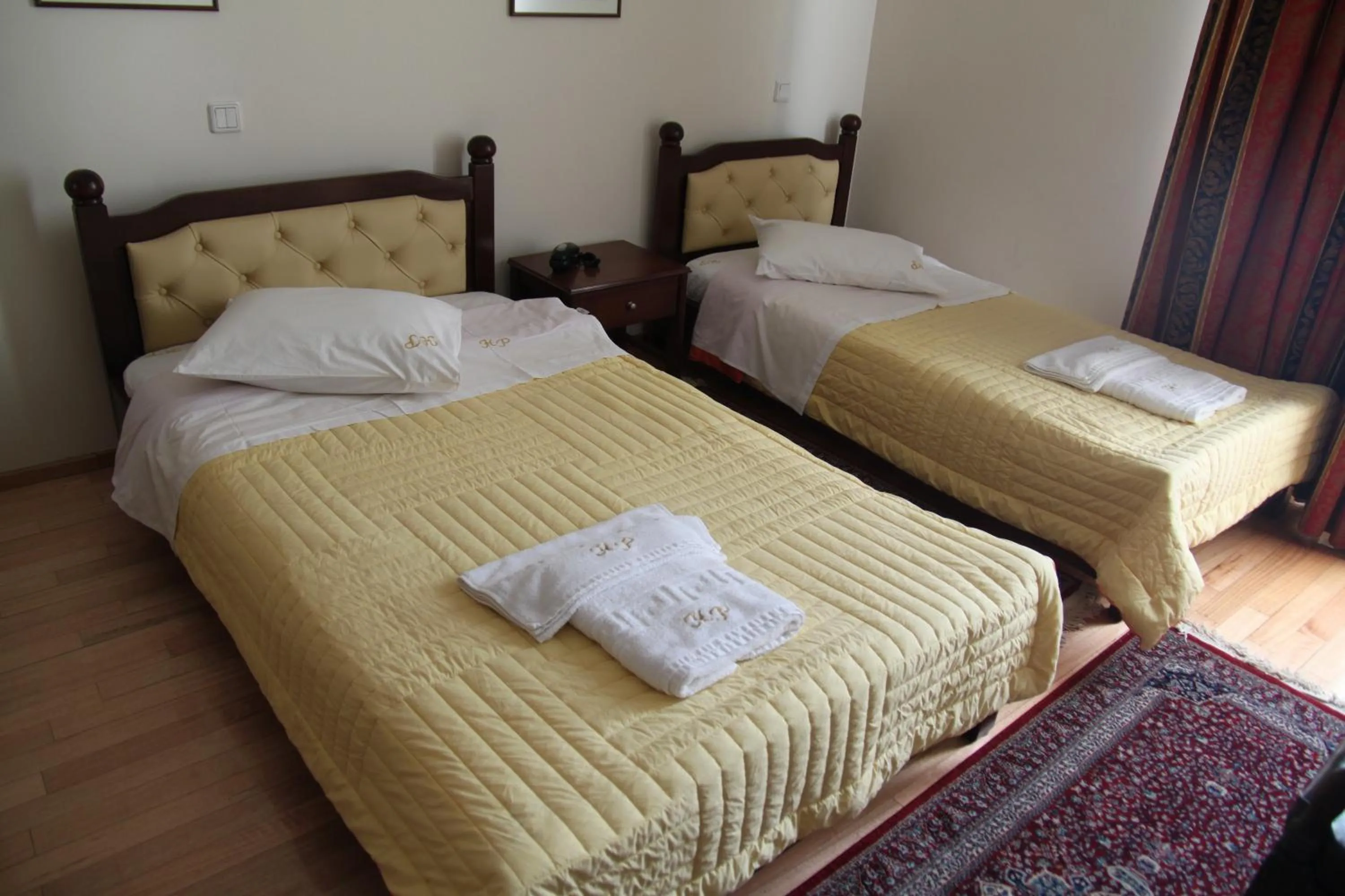 Bed in Hotel Panellinion