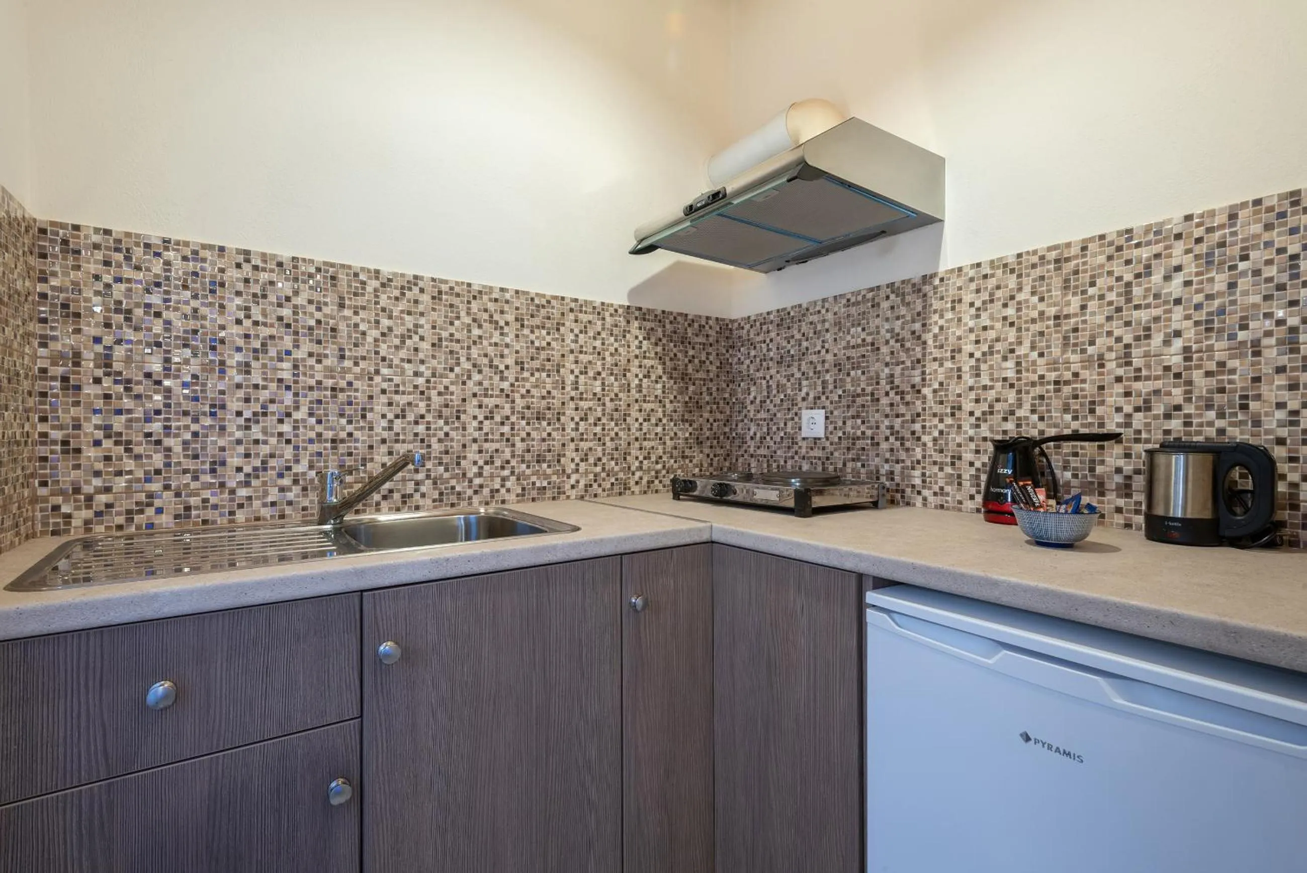 Kitchen or kitchenette in Sunset Hotel