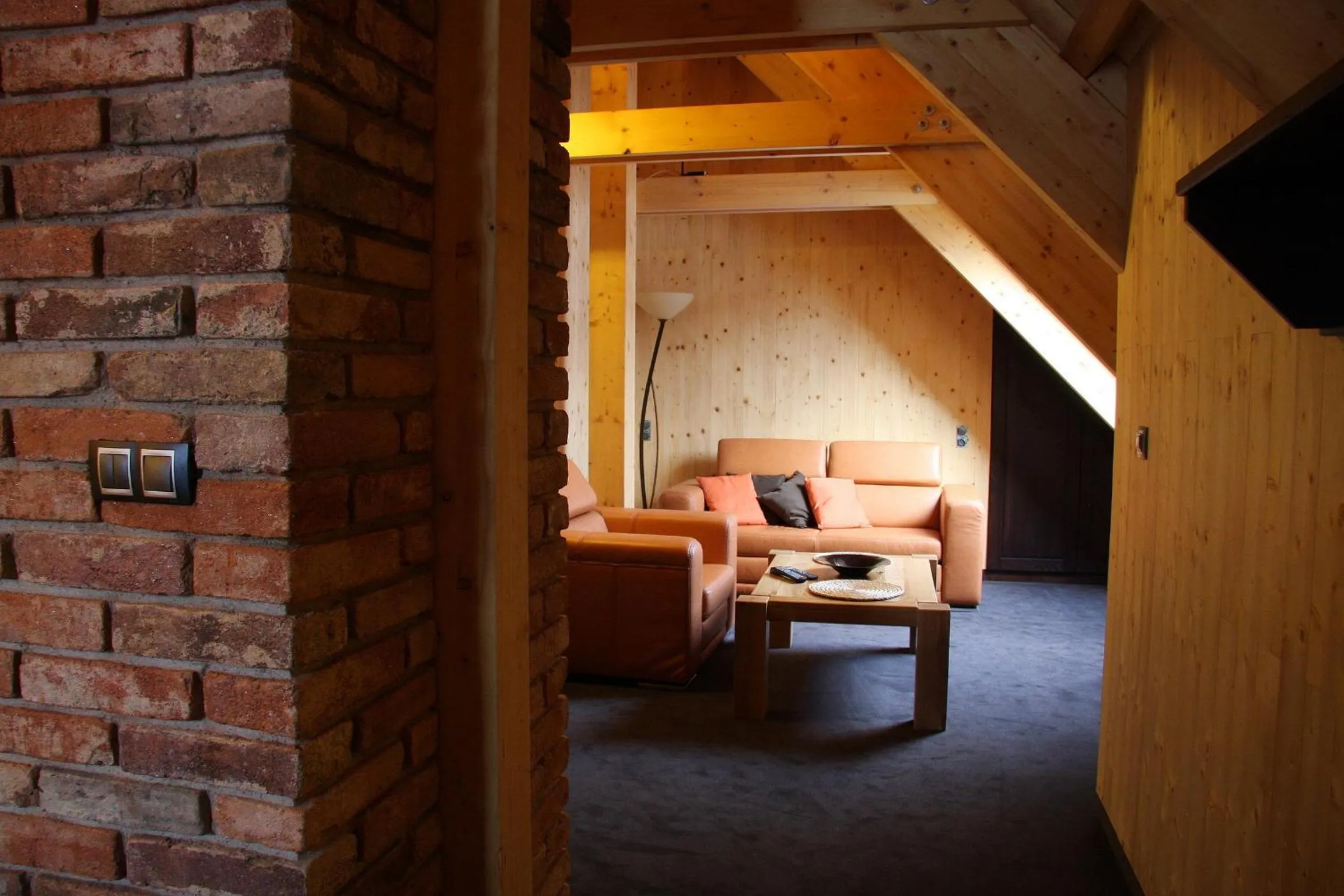 Seating area in Krakonošova Dílna "WOODHAUS"