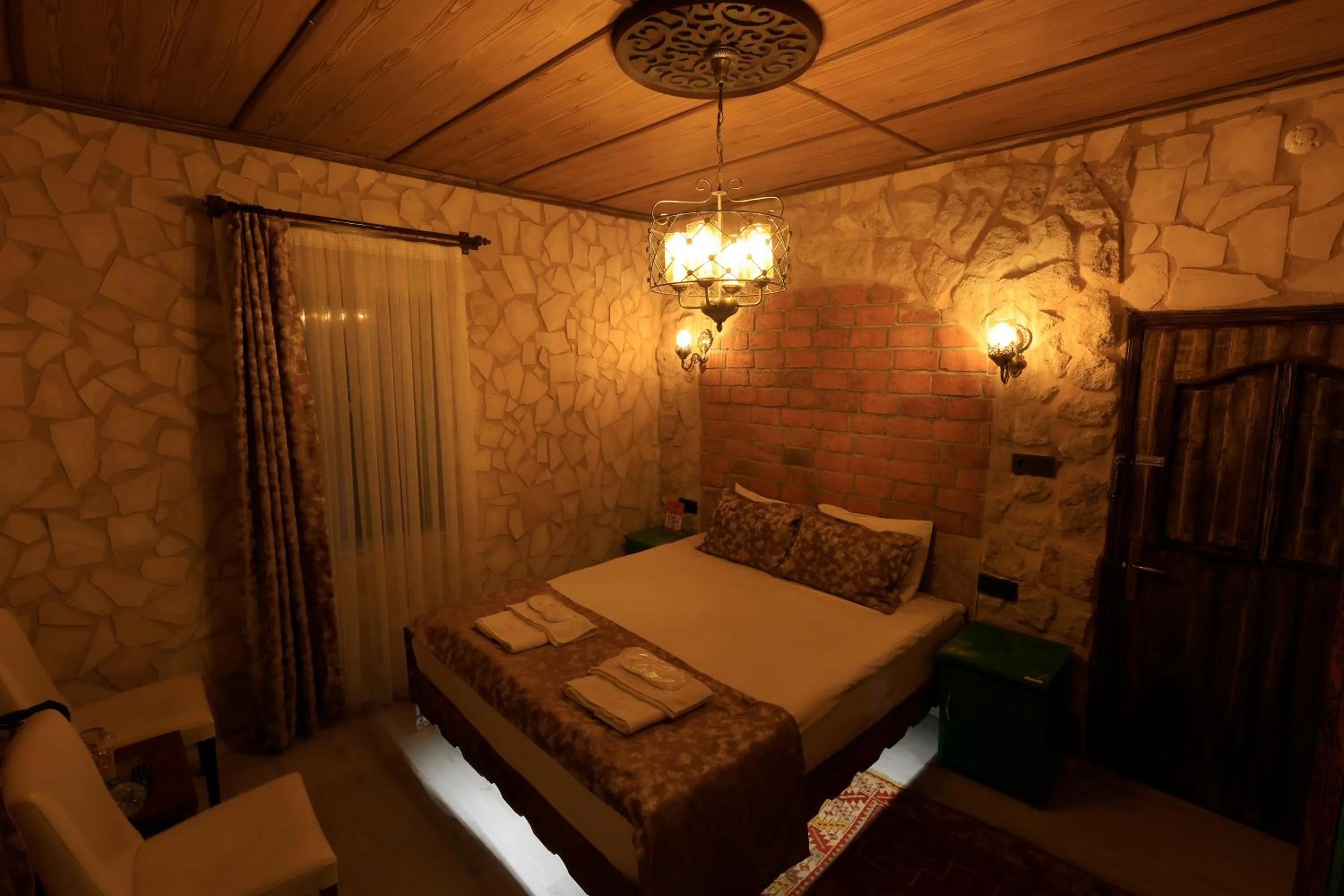 Bed in KEMAL STONE HOUSE HOTEL.