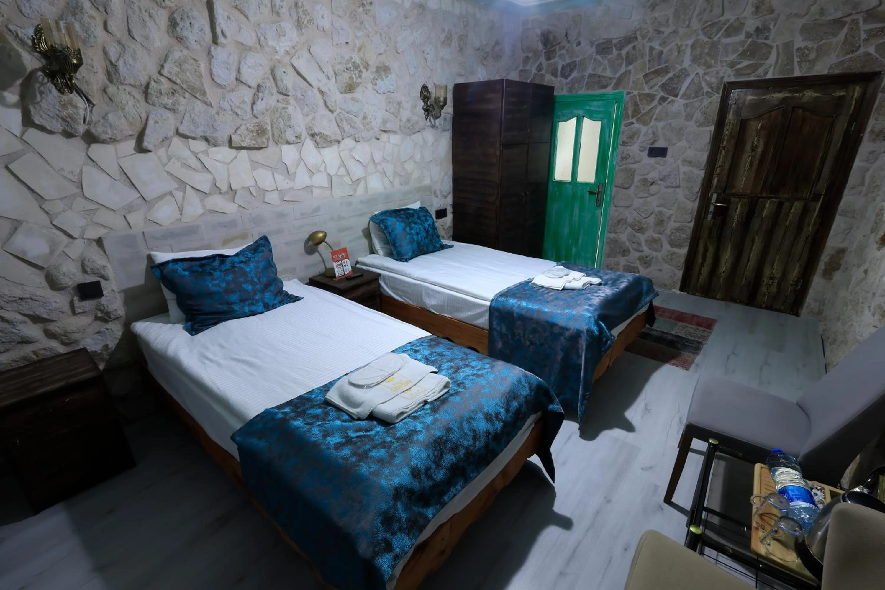 Bed in KEMAL STONE HOUSE HOTEL.