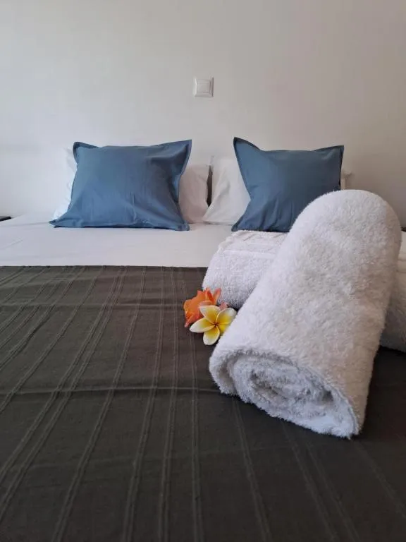 Bed in Triton Authentic Cretan Hotel