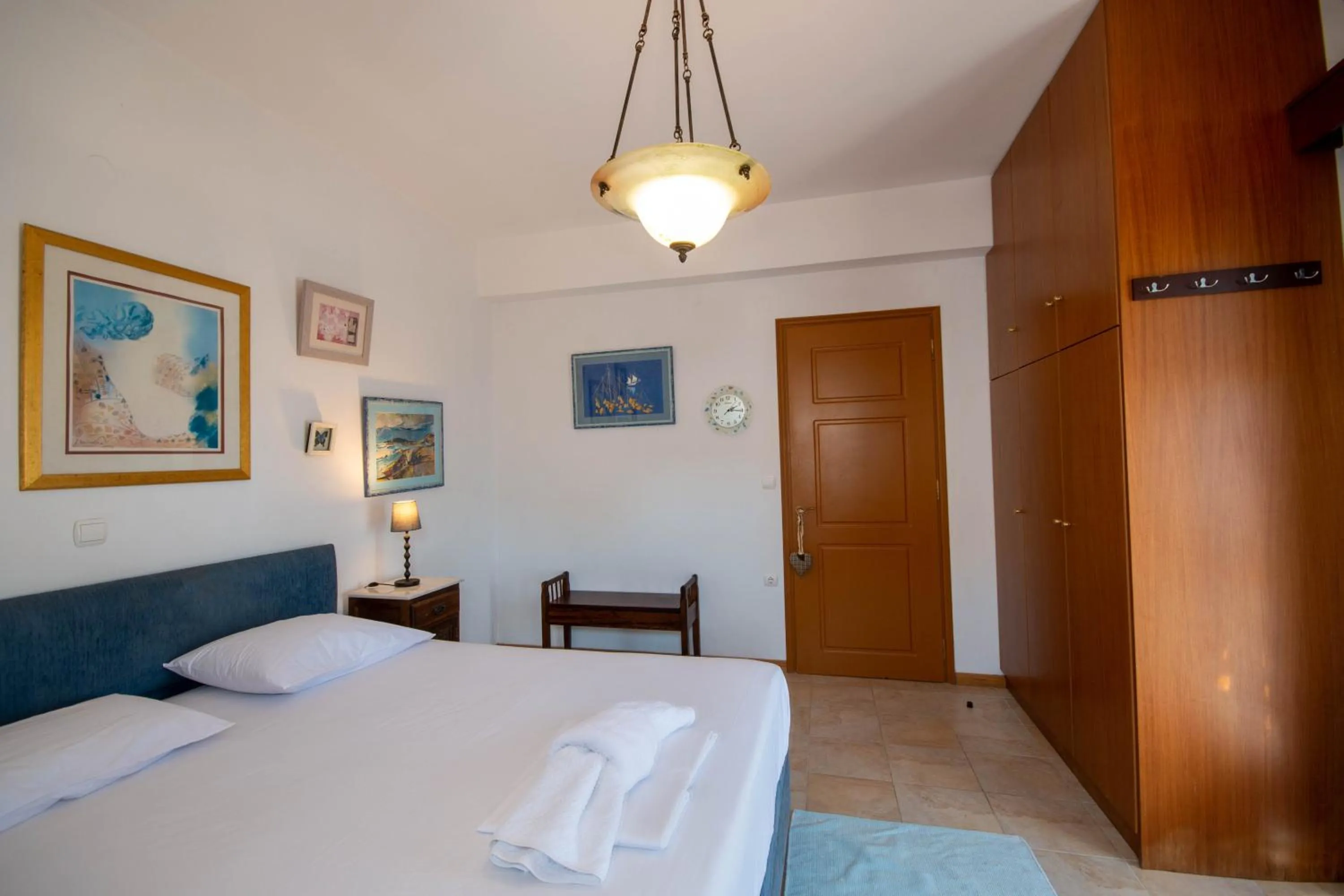 Bed in Triton Authentic Cretan Hotel