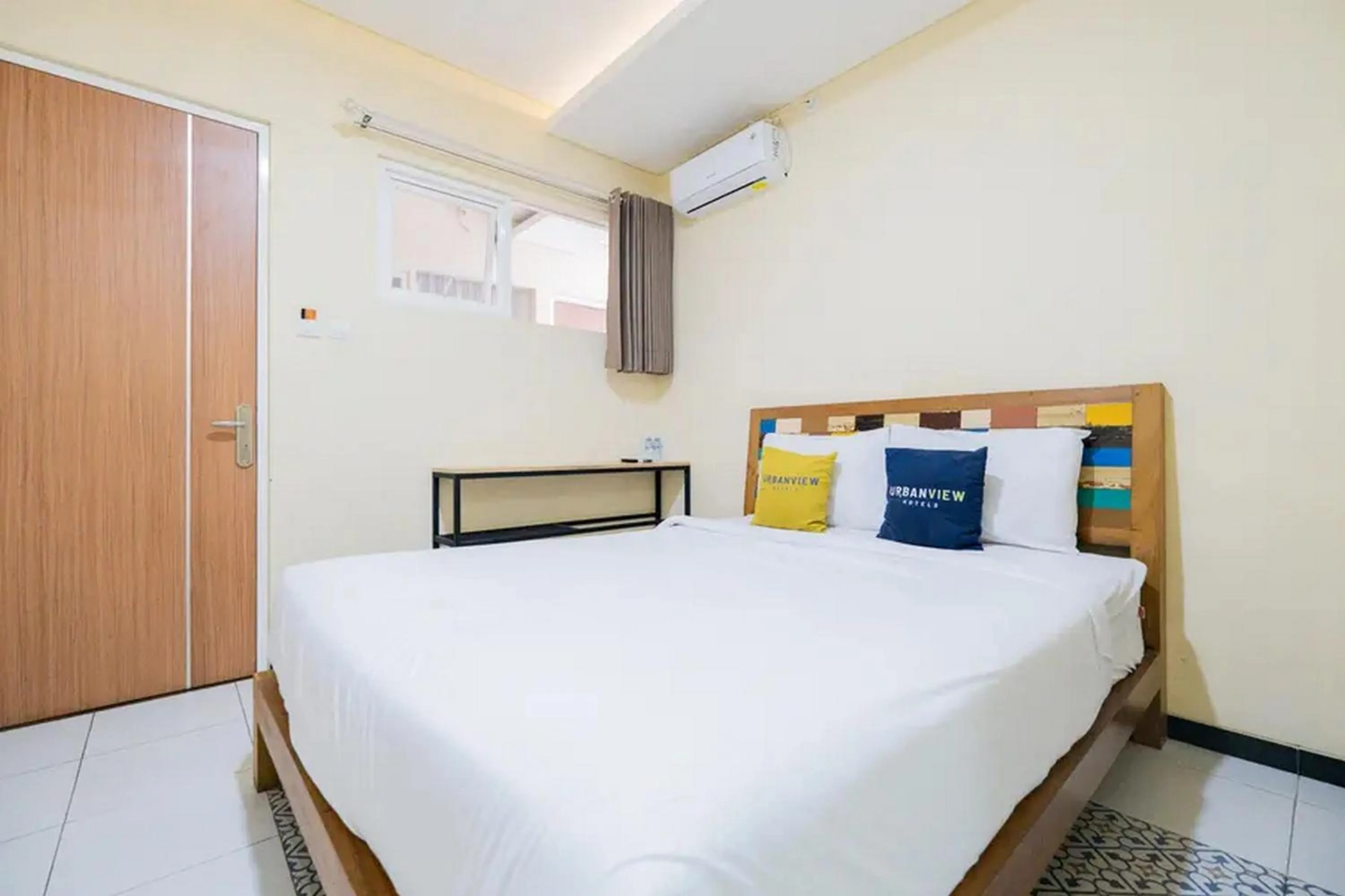 Bed in Urbanview Hotel Omah Anin Batu by RedDoorz