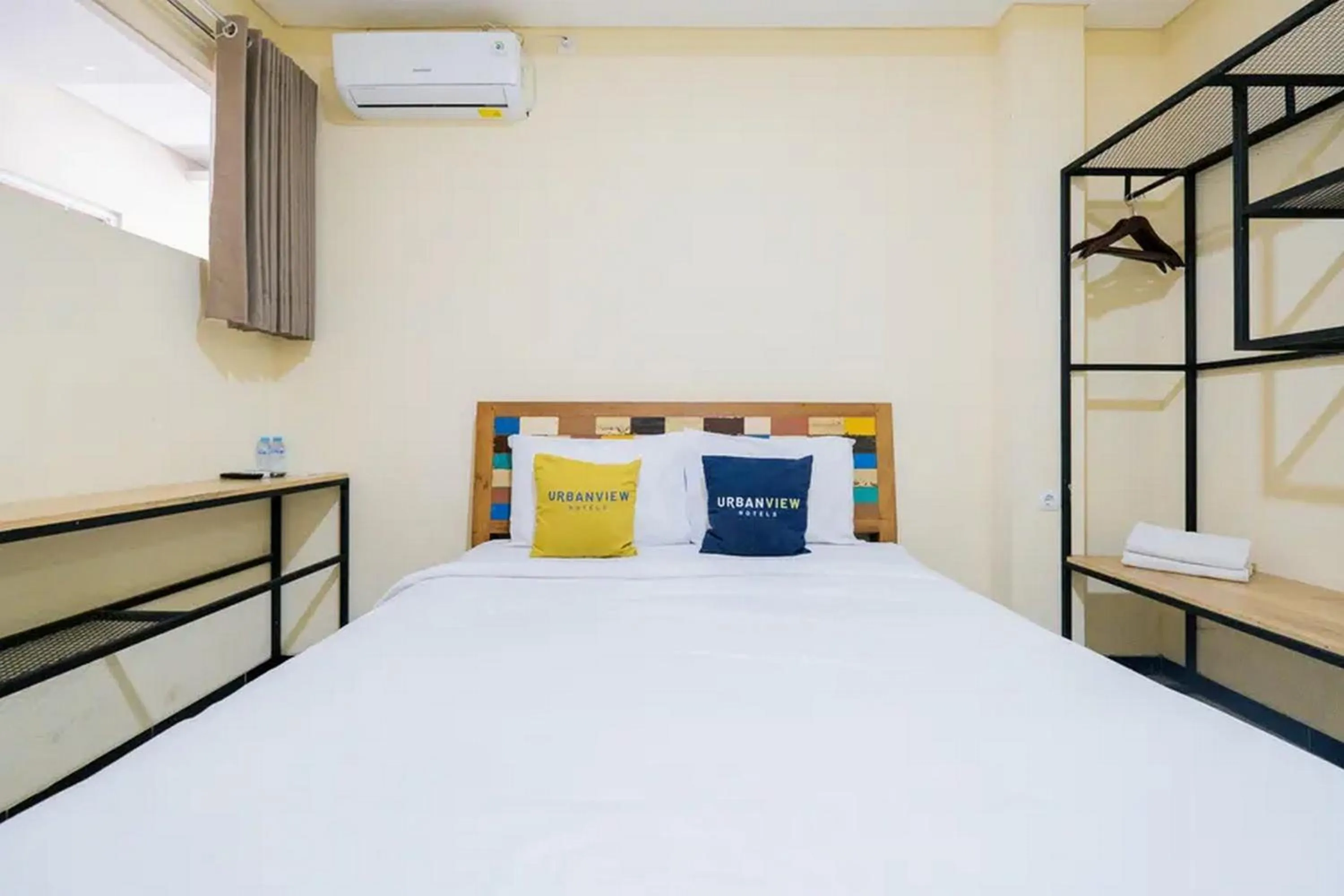 Bed in Urbanview Hotel Omah Anin Batu by RedDoorz
