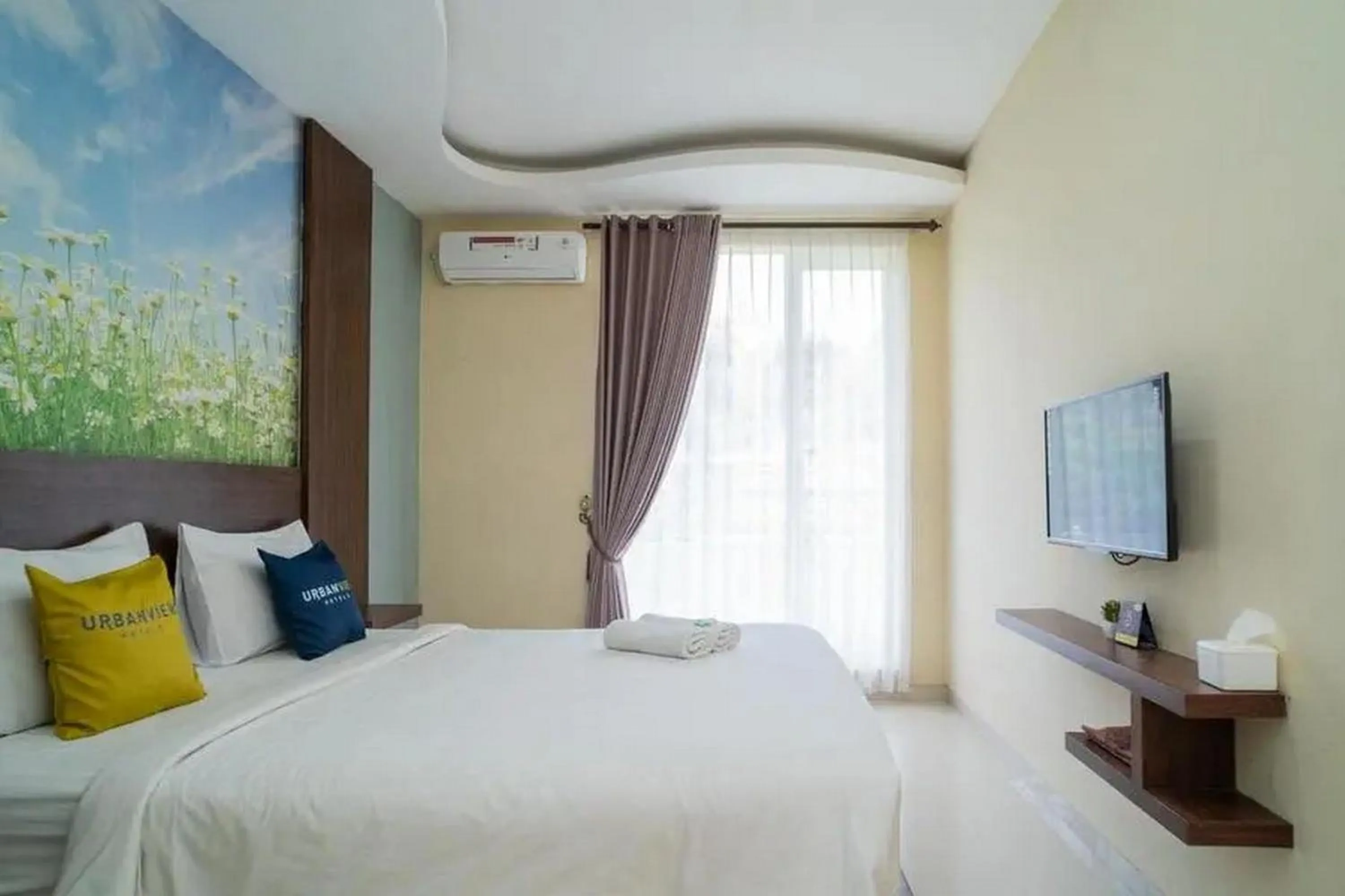Bed in Urbanview Hotel Omah Anin Batu by RedDoorz