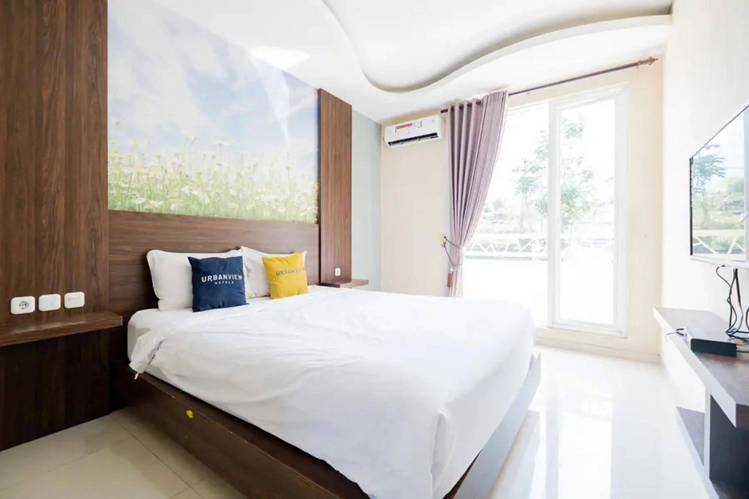 Bed in Urbanview Hotel Omah Anin Batu by RedDoorz