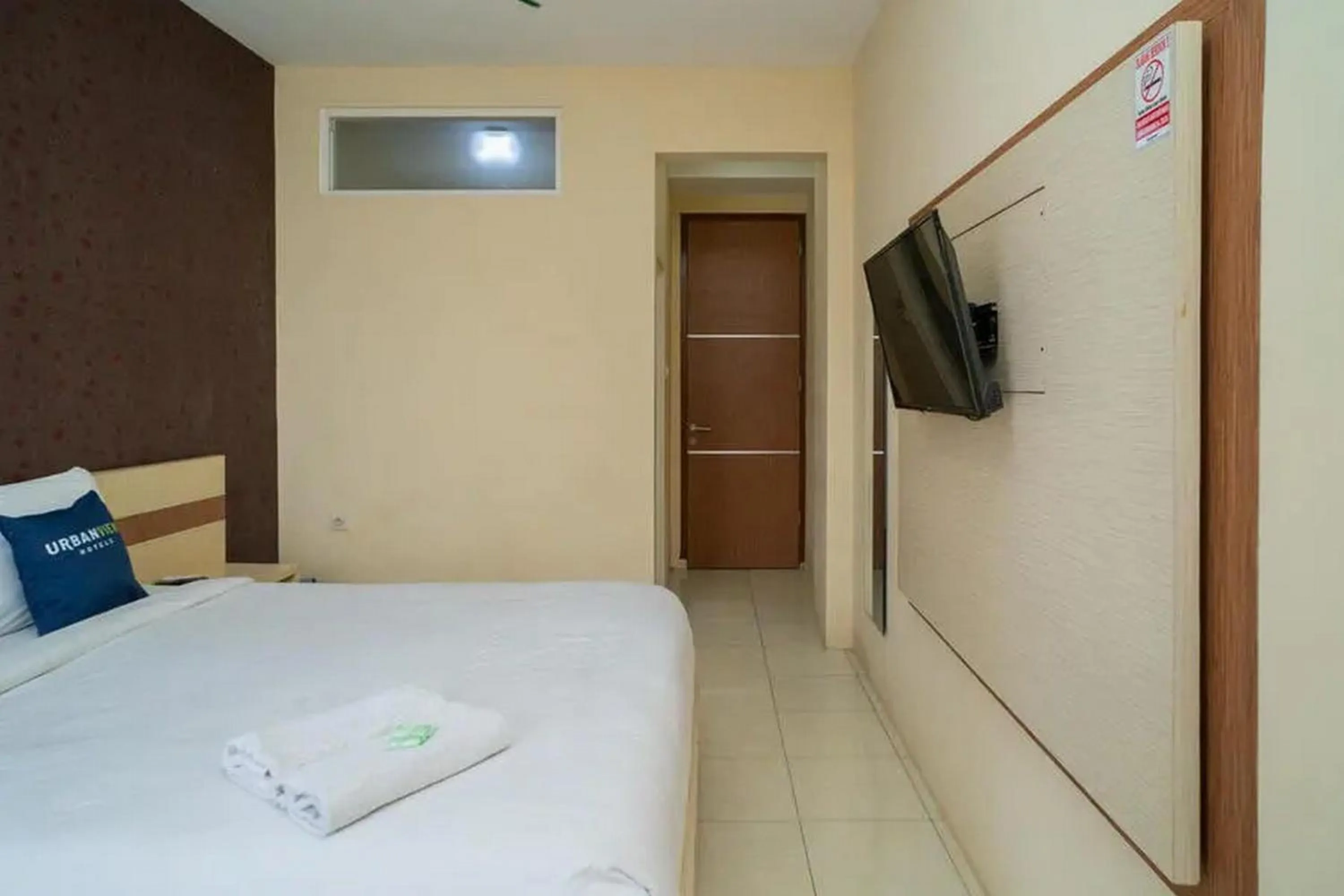 Bed in Urbanview Hotel Omah Anin Batu by RedDoorz
