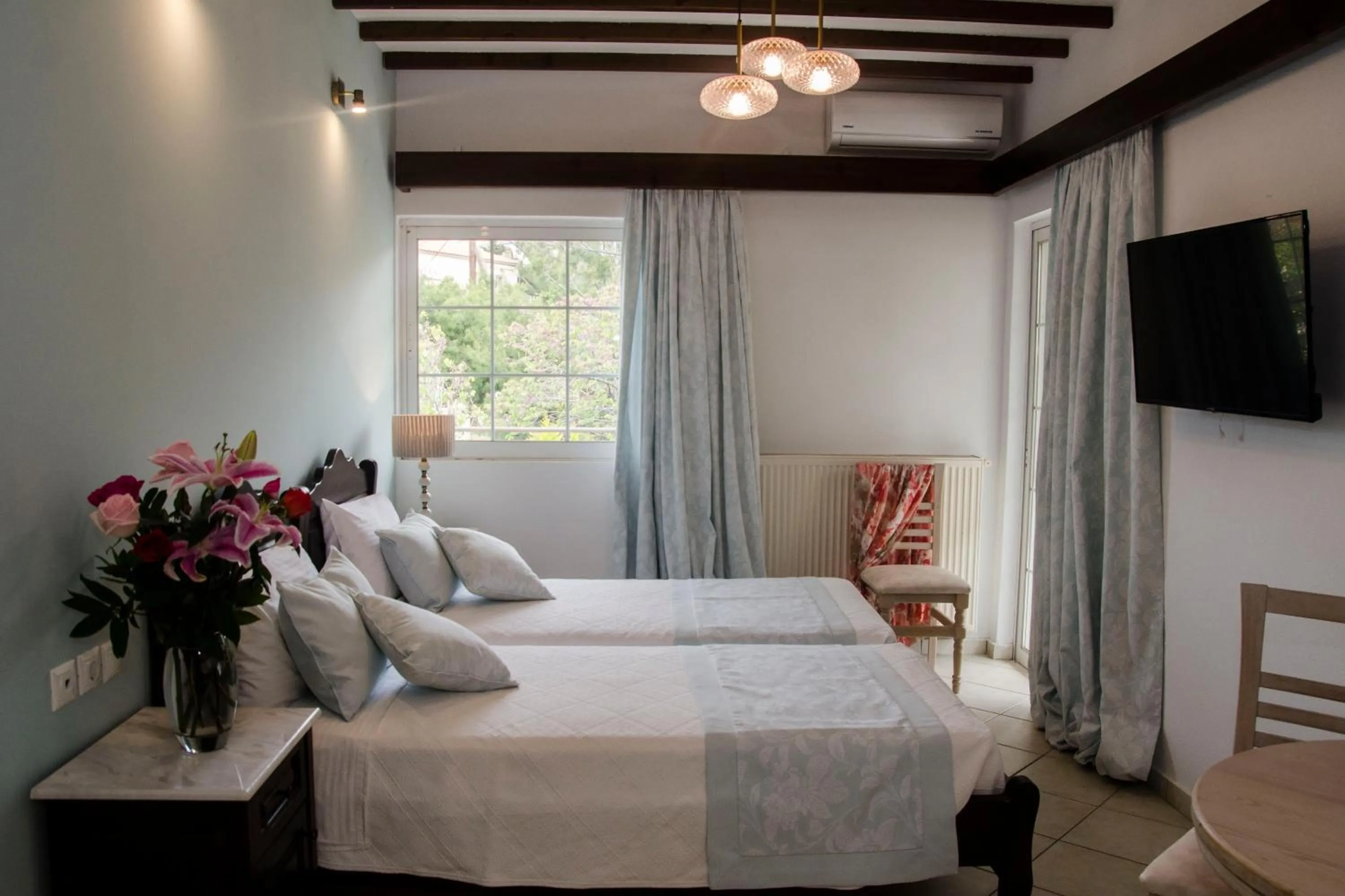 Bed in Afrodite Hotel Apartments