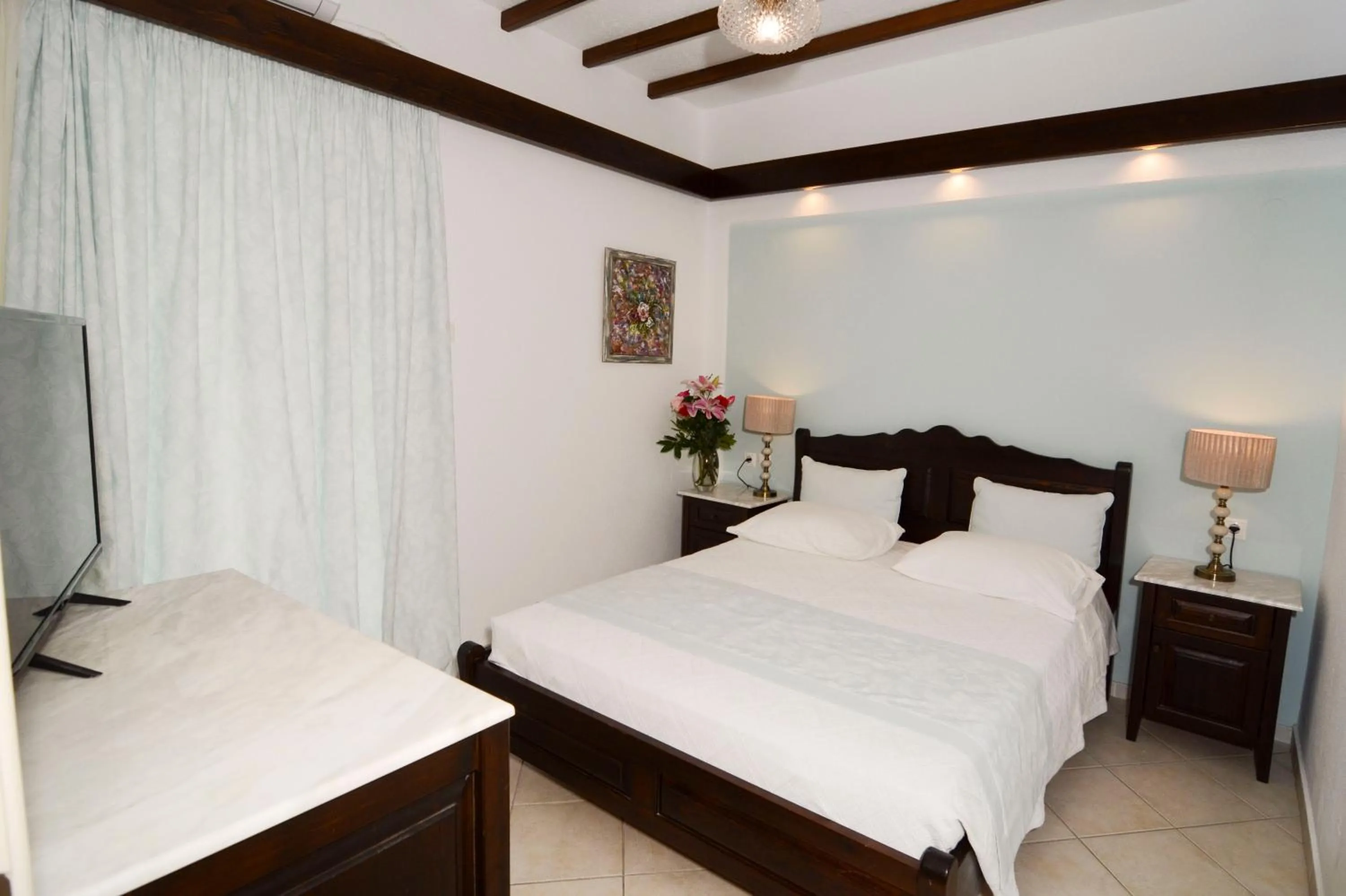 Bed in Afrodite Hotel Apartments