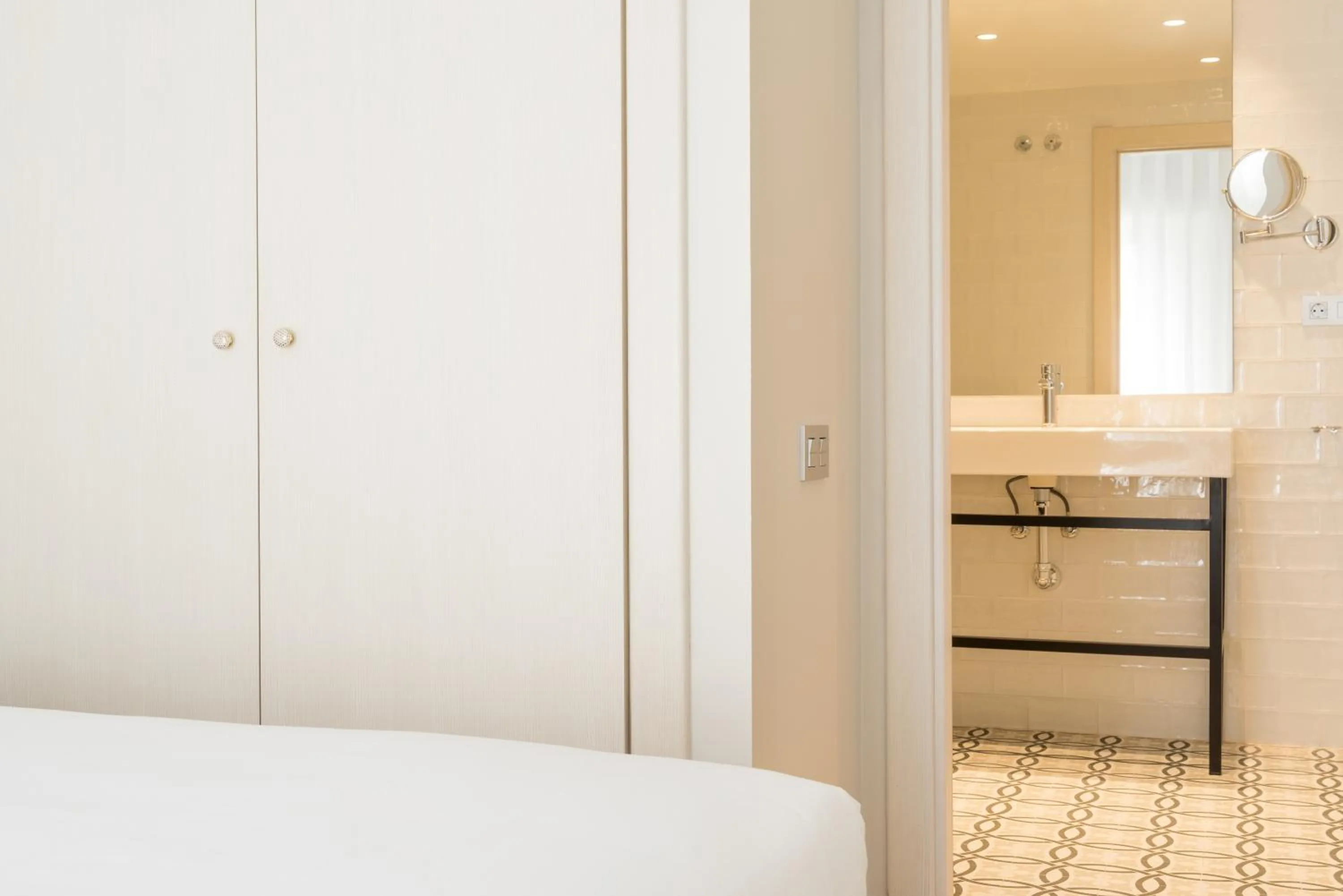 Bed in Tandem Soho Suites