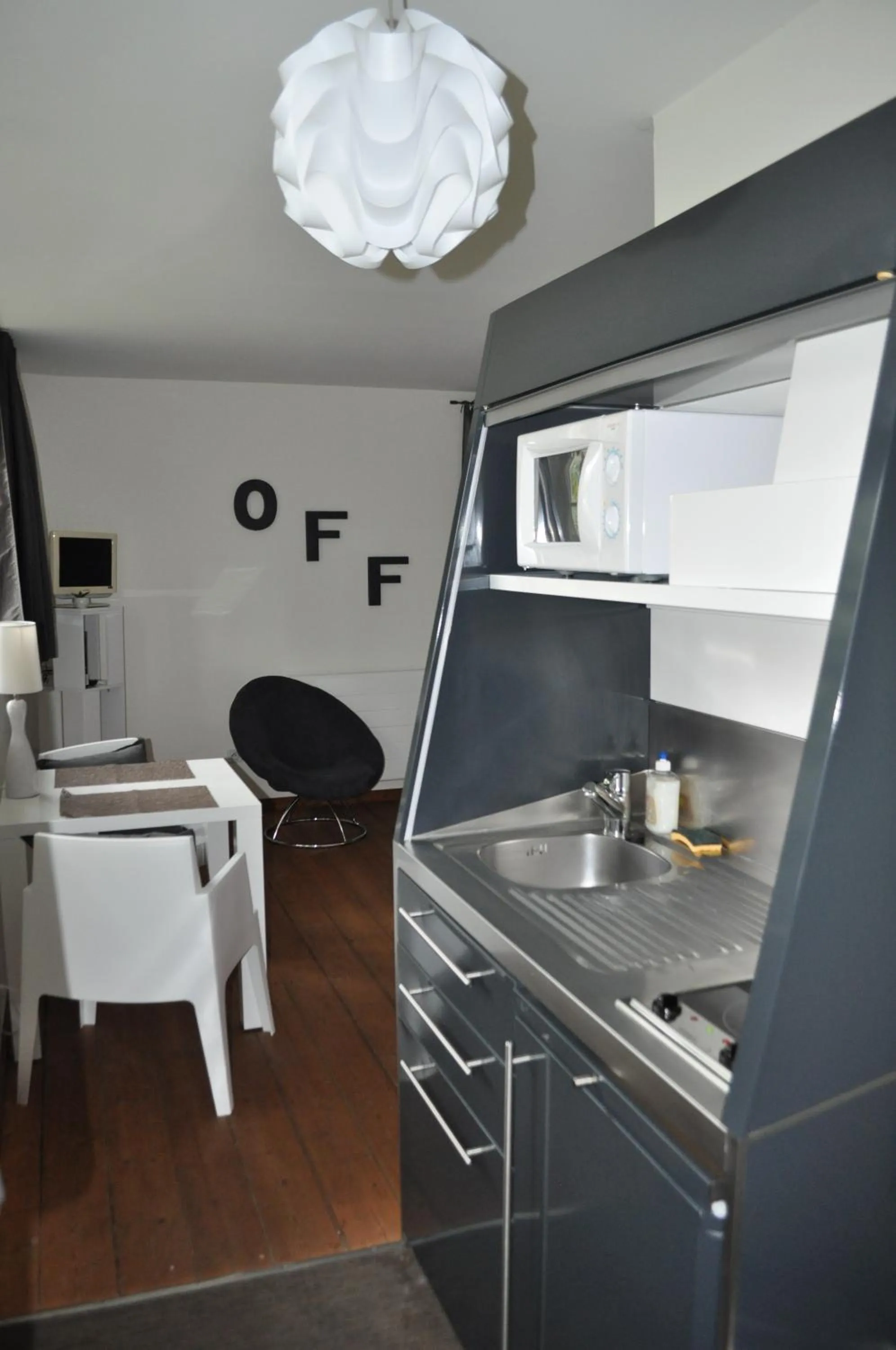 Kitchen or kitchenette in Au Cœur du Jardin