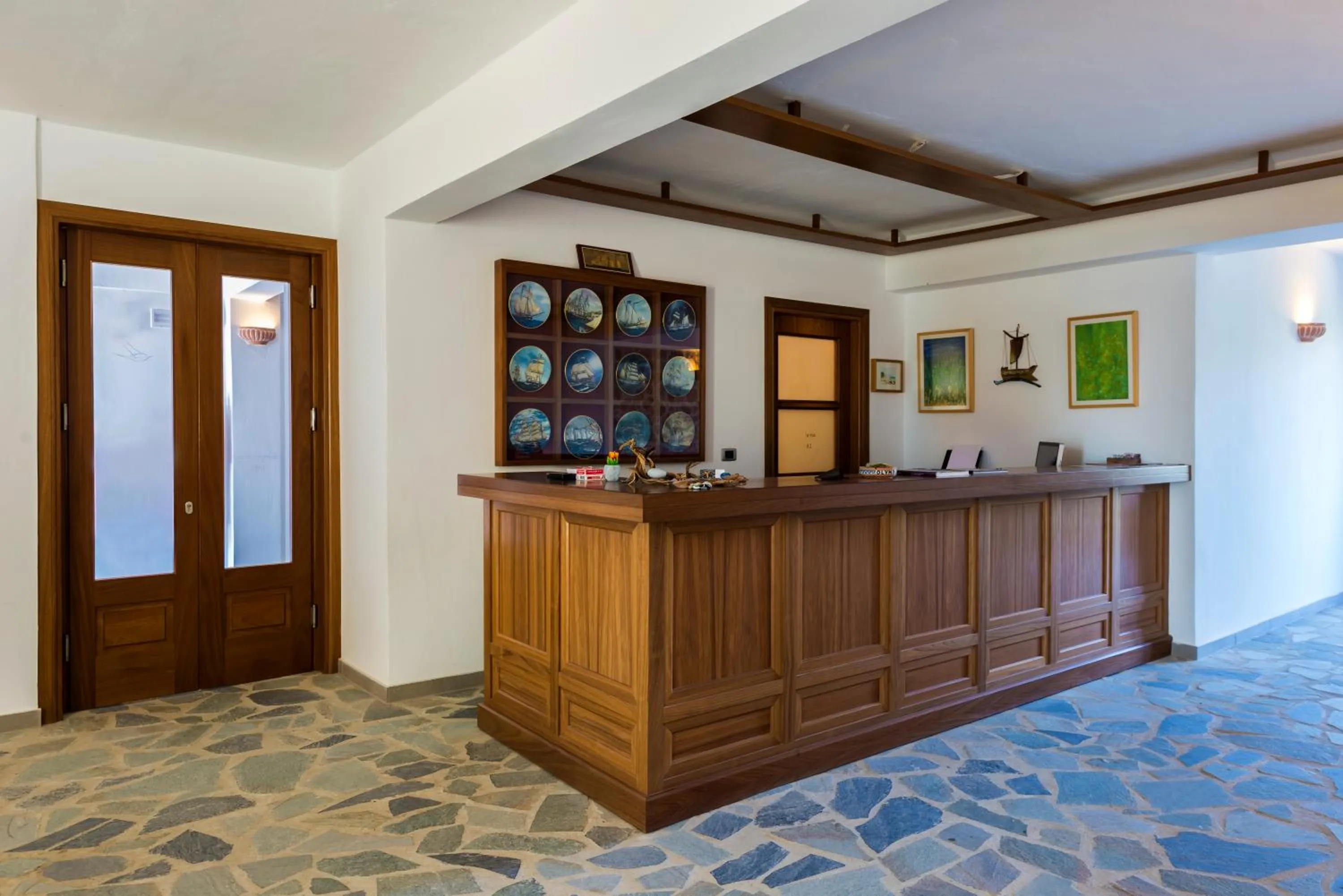 Lobby or reception in Olympia Mare