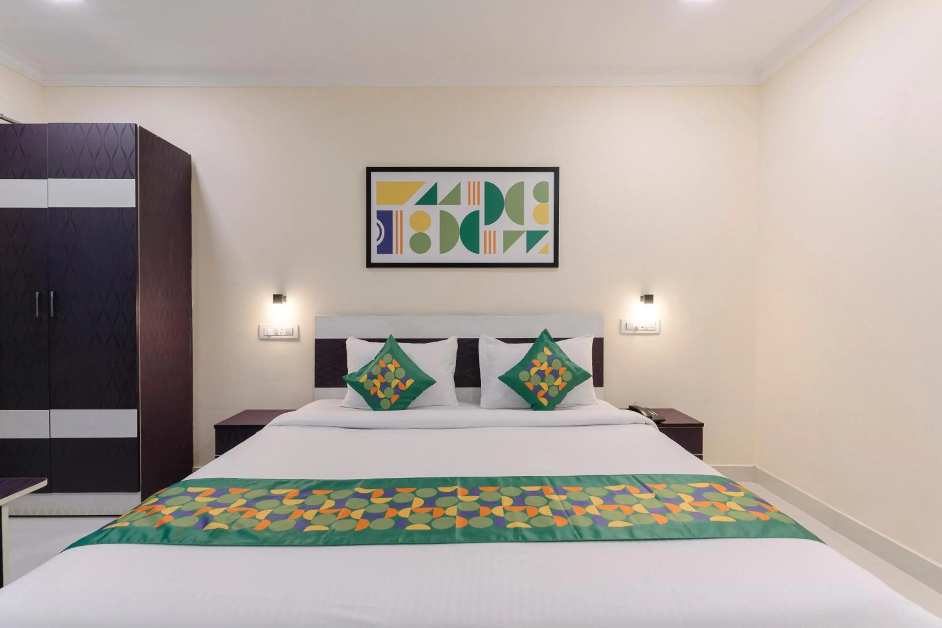 Bedroom, Bed in Treebo SNS Grand Inn With Swimming Pool