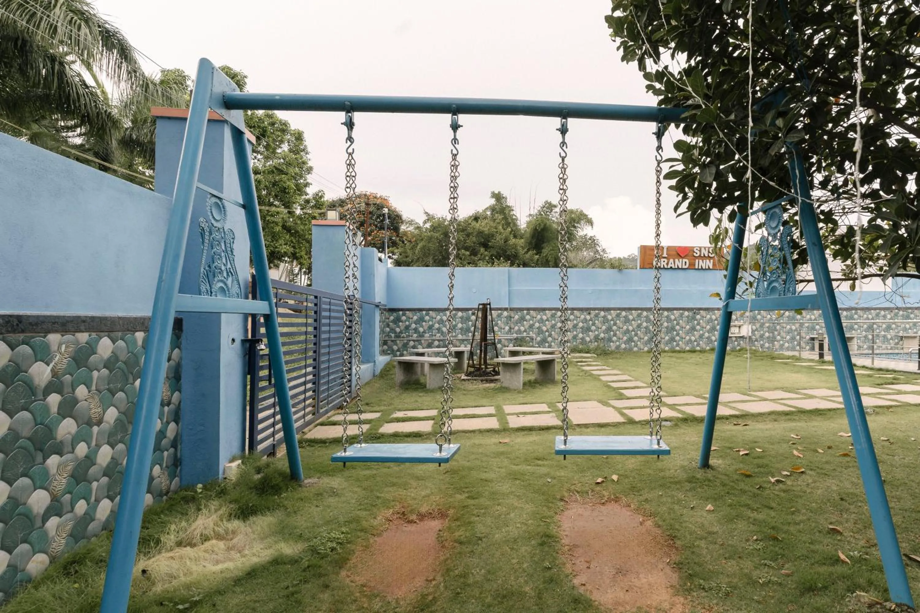 Children play ground in Treebo SNS Grand Inn With Swimming Pool