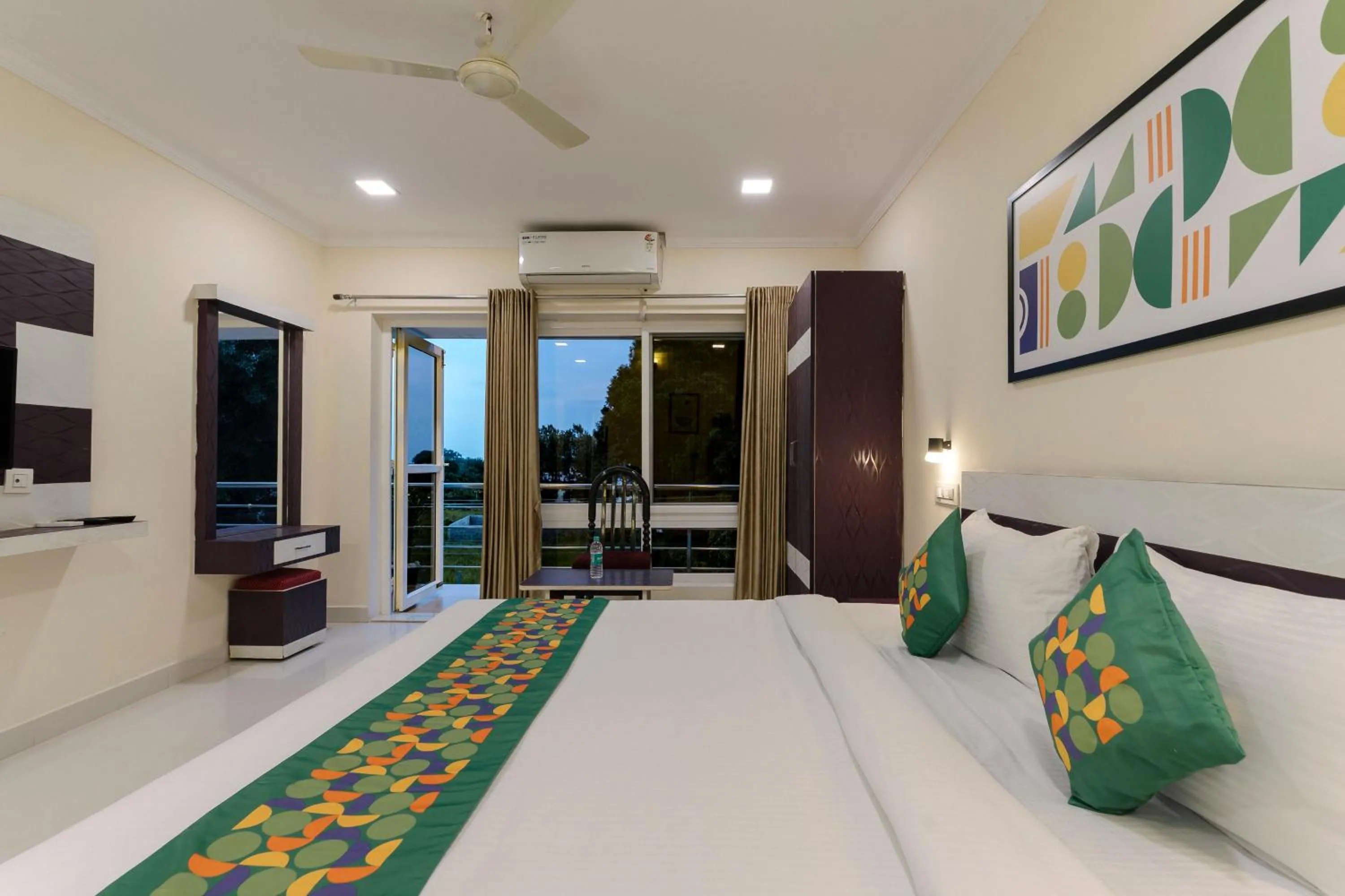 Bedroom, Bed in Treebo SNS Grand Inn With Swimming Pool