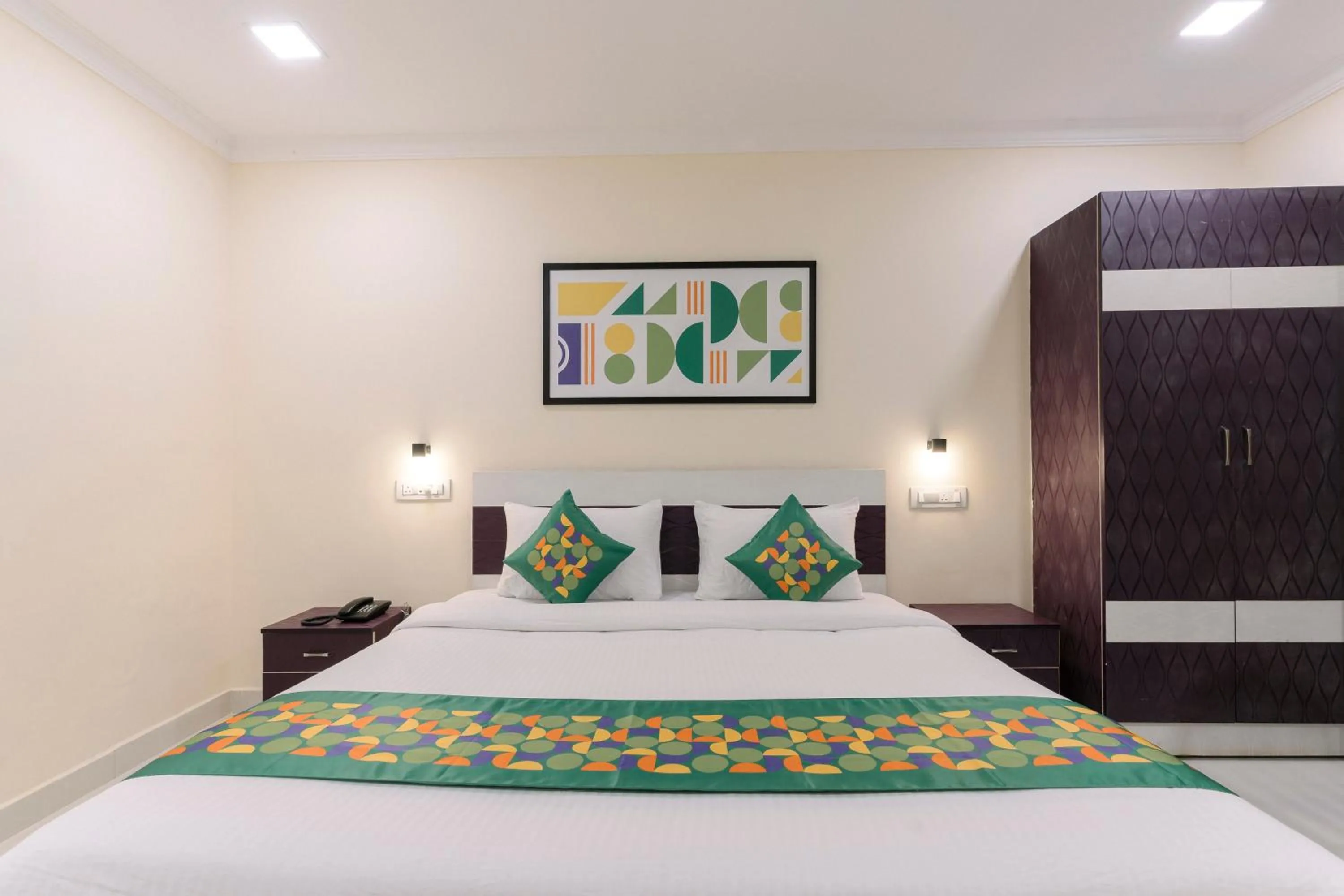 Bedroom, Bed in Treebo SNS Grand Inn With Swimming Pool