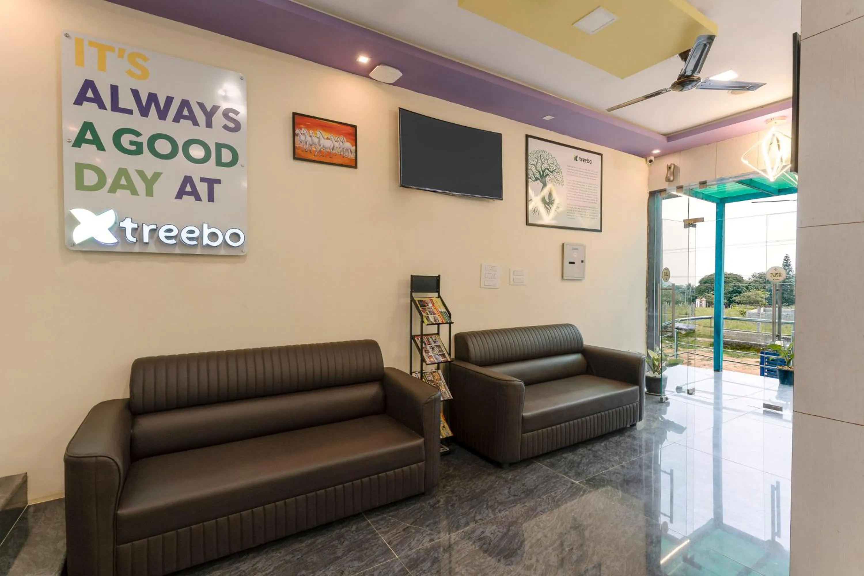 Seating area in Treebo SNS Grand Inn With Swimming Pool
