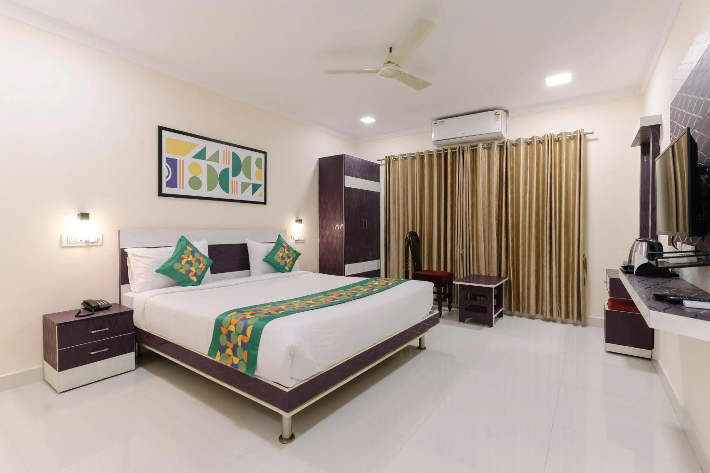 Bedroom, Bed in Treebo SNS Grand Inn With Swimming Pool