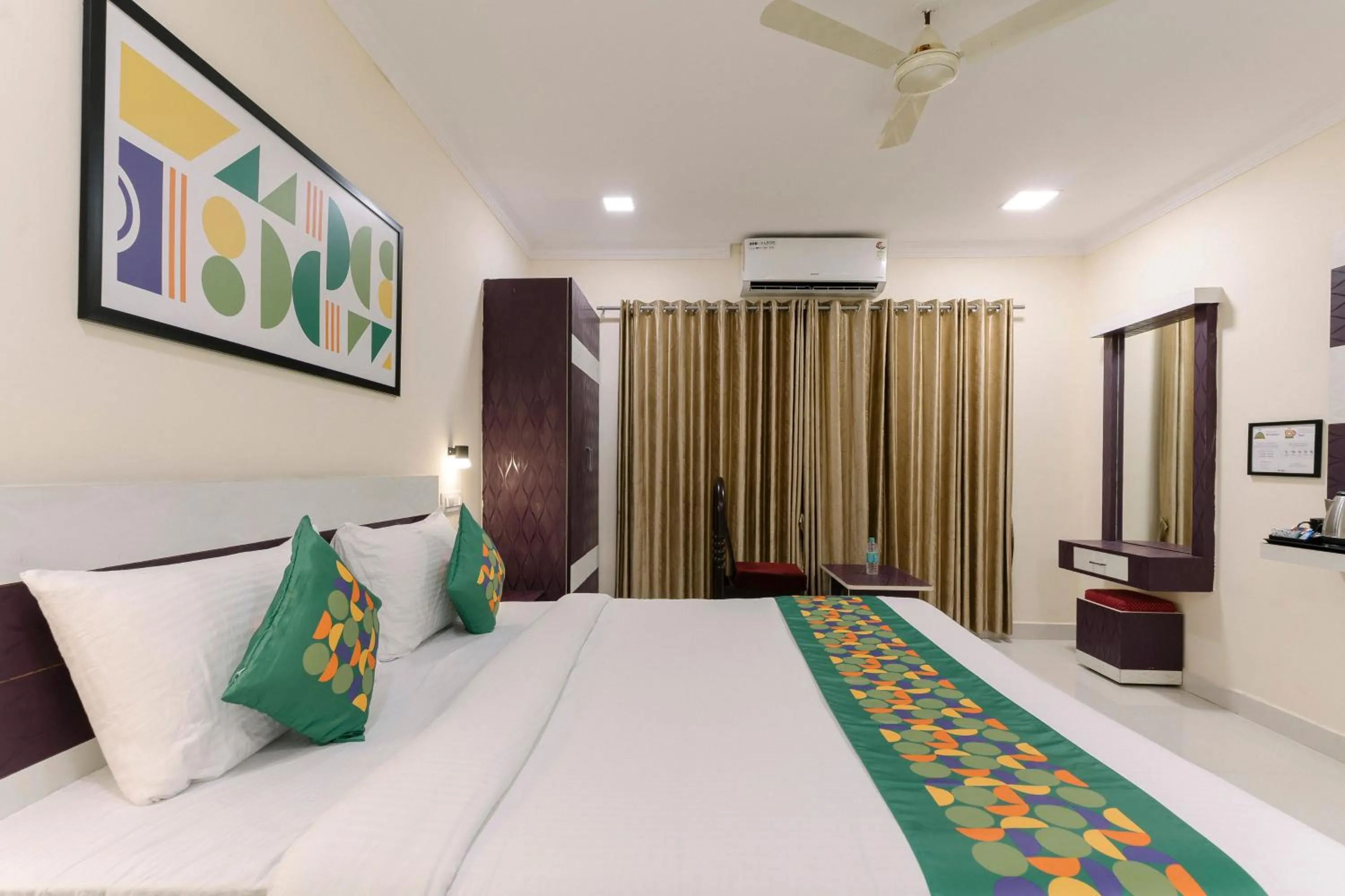 Bedroom, Bed in Treebo SNS Grand Inn With Swimming Pool