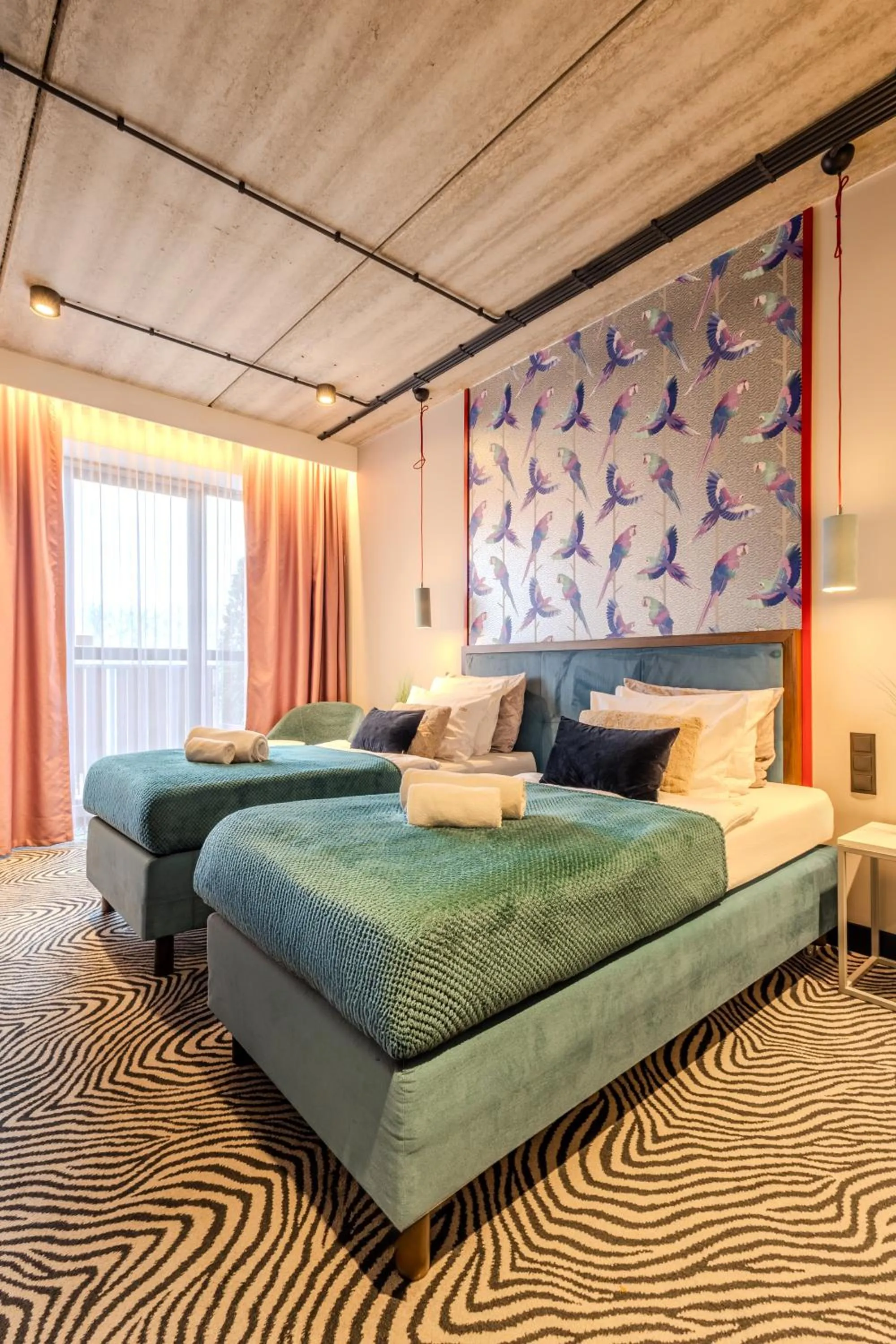 Bed in Hotel Zoo by Afrykarium Wroclaw