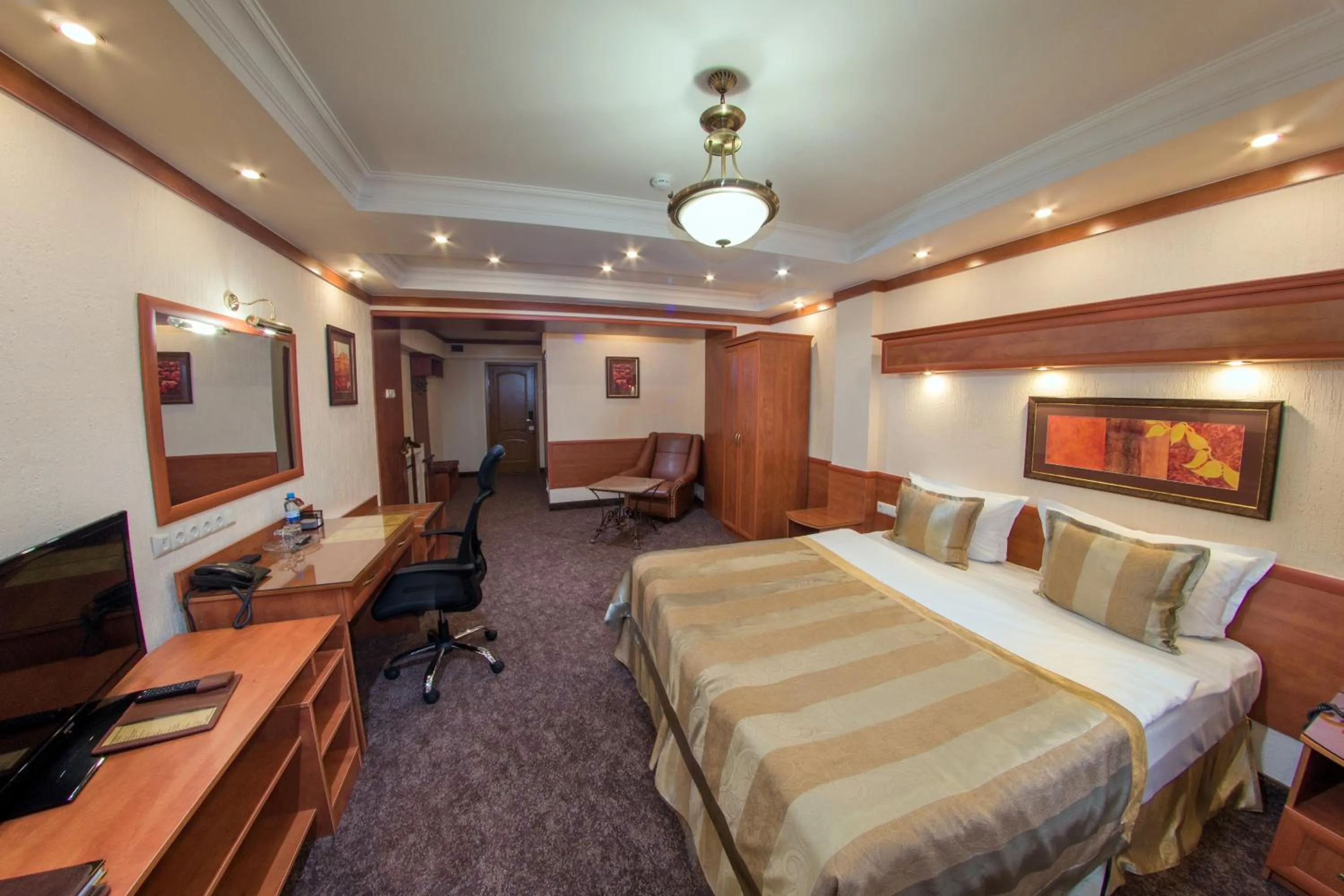 Photo of the whole room, Bed in Hotel Uyut Almaty