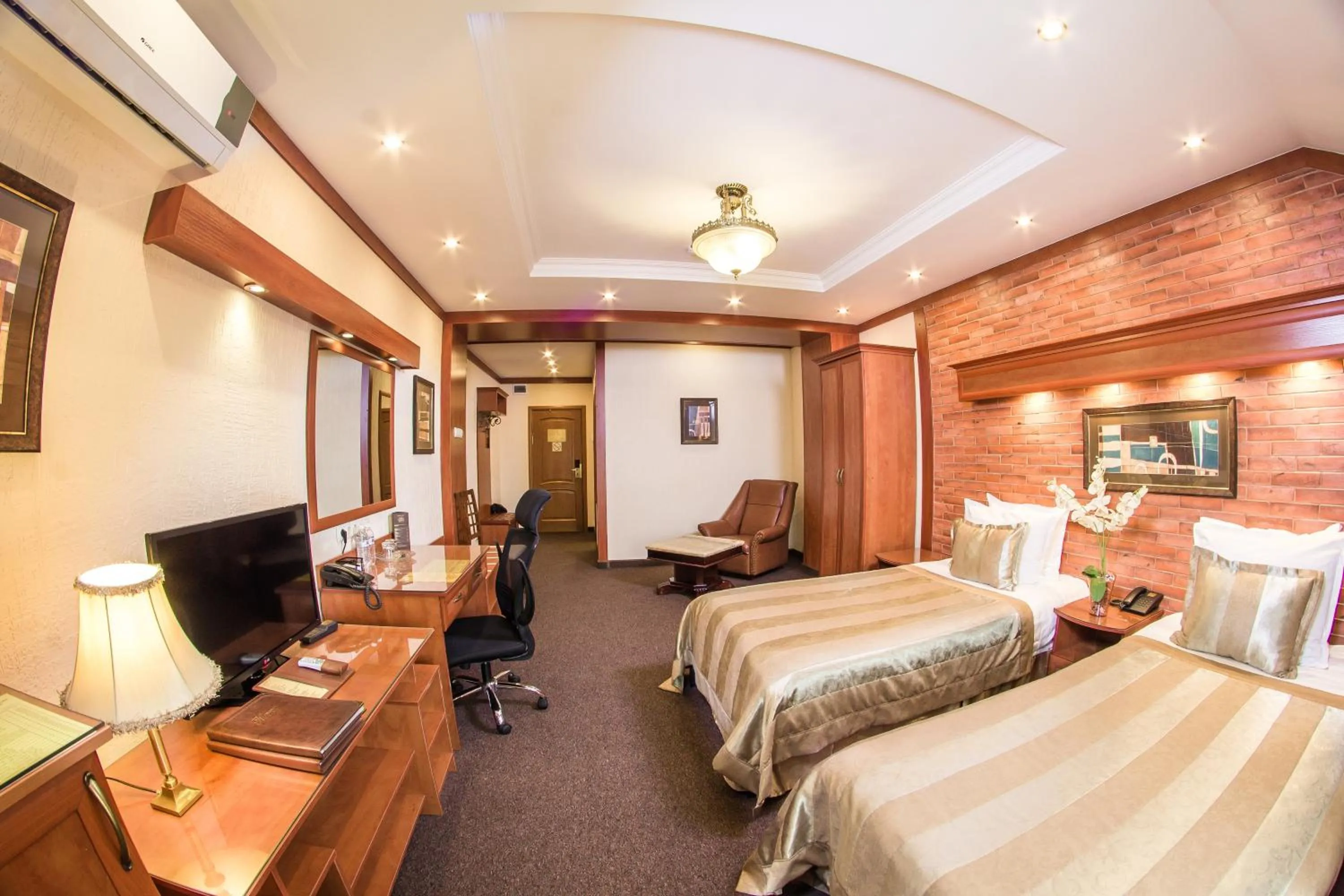 Bed in Hotel Uyut Almaty