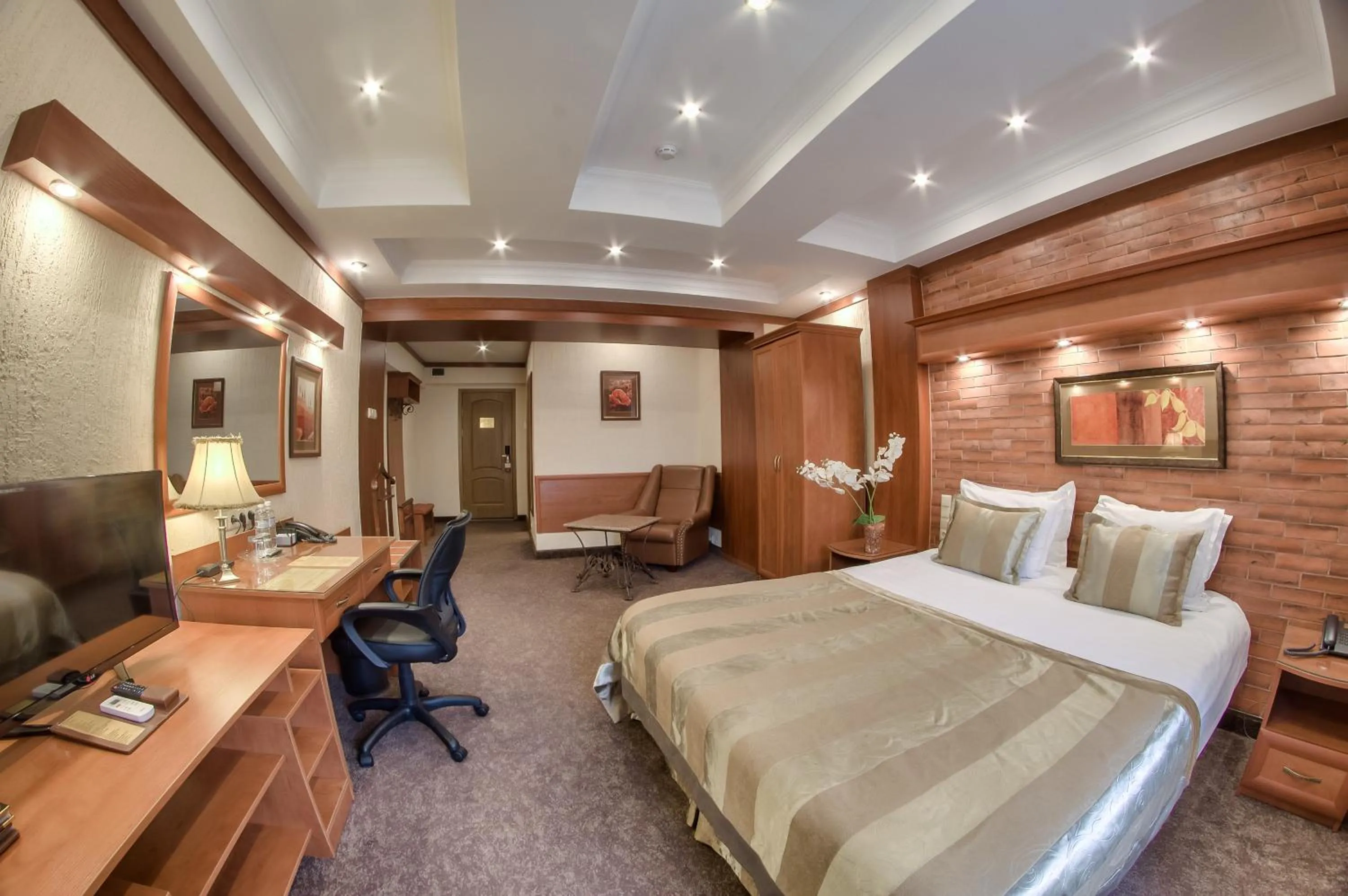 Photo of the whole room, Bed in Hotel Uyut Almaty