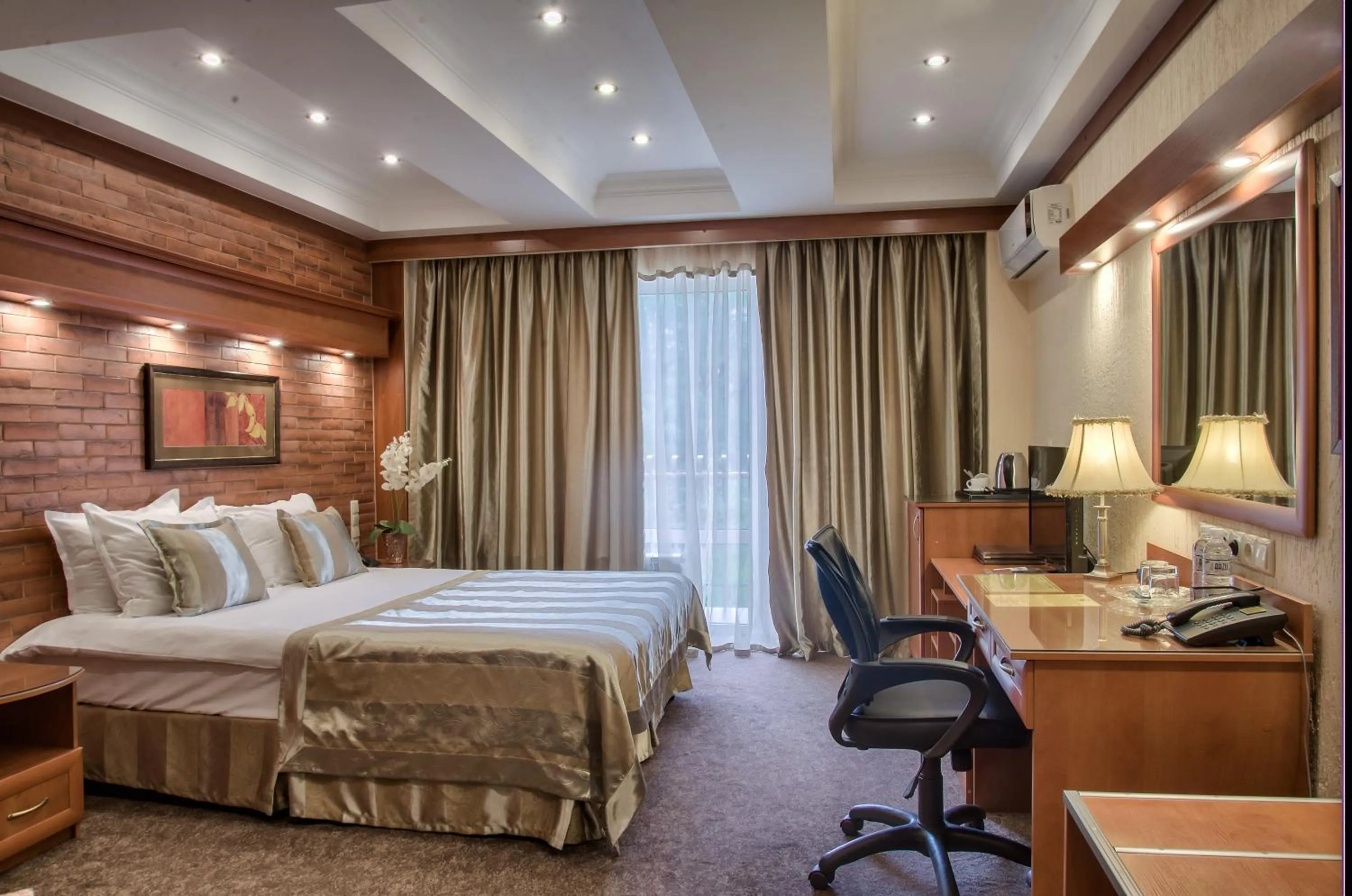 Photo of the whole room, Bed in Hotel Uyut Almaty